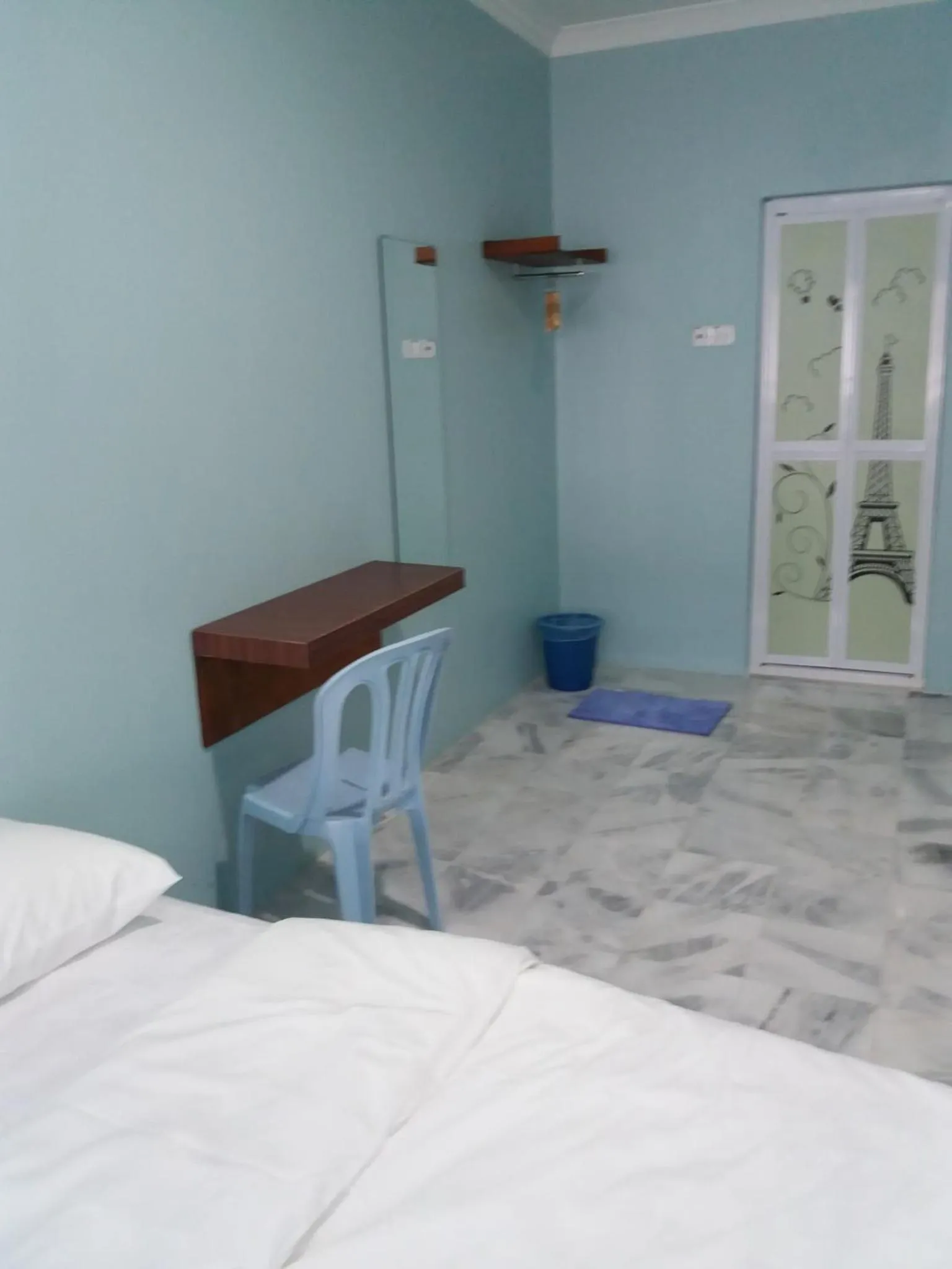 Bed in JS Guest House Air Putih