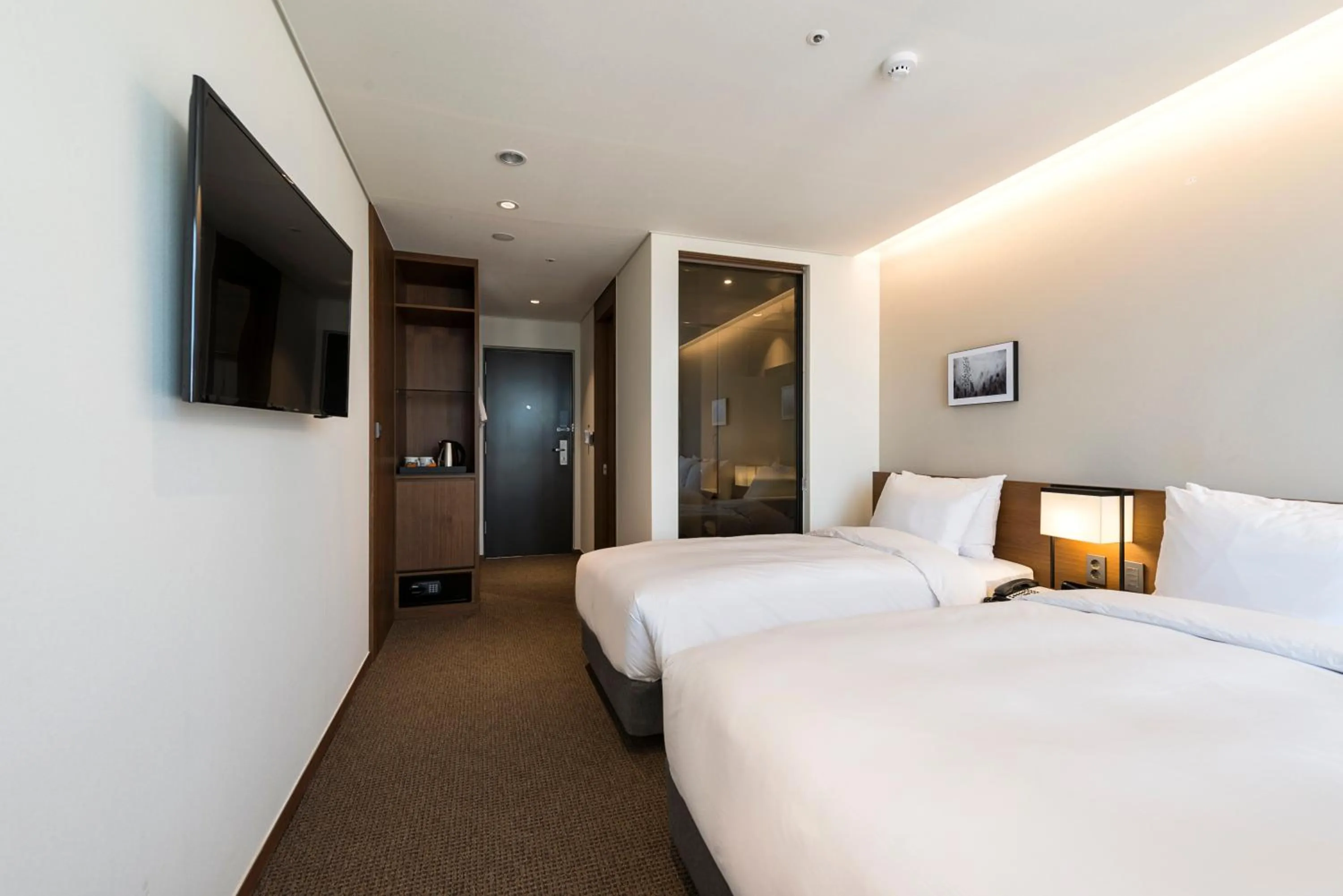 Bed in Ramada Encore by Wyndham Busan Haeundae