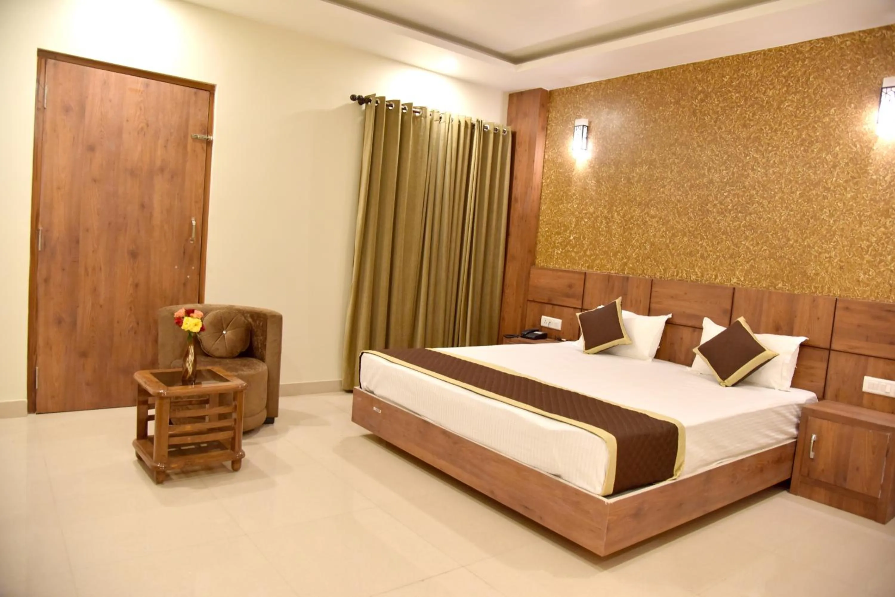 Photo of the whole room, Bed in Hotel Triveni Residency