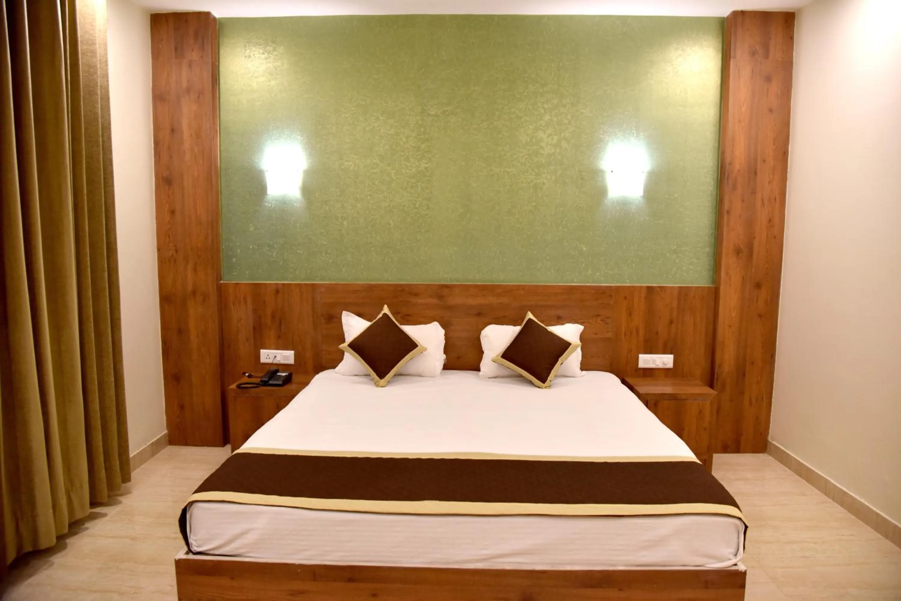 Photo of the whole room, Bed in Hotel Triveni Residency