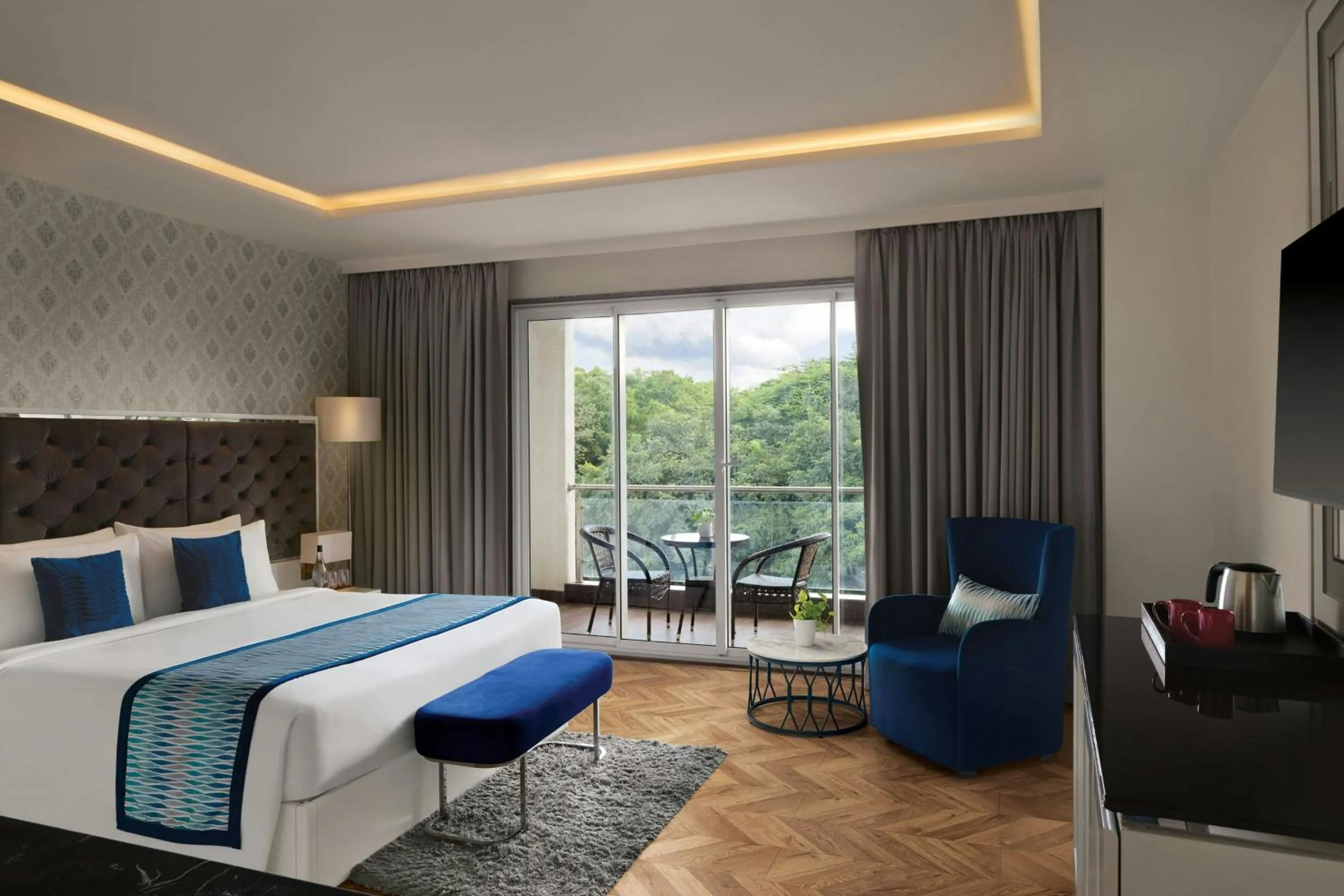 Photo of the whole room, Bed in Amanora The Fern Pune, Series by Marriott