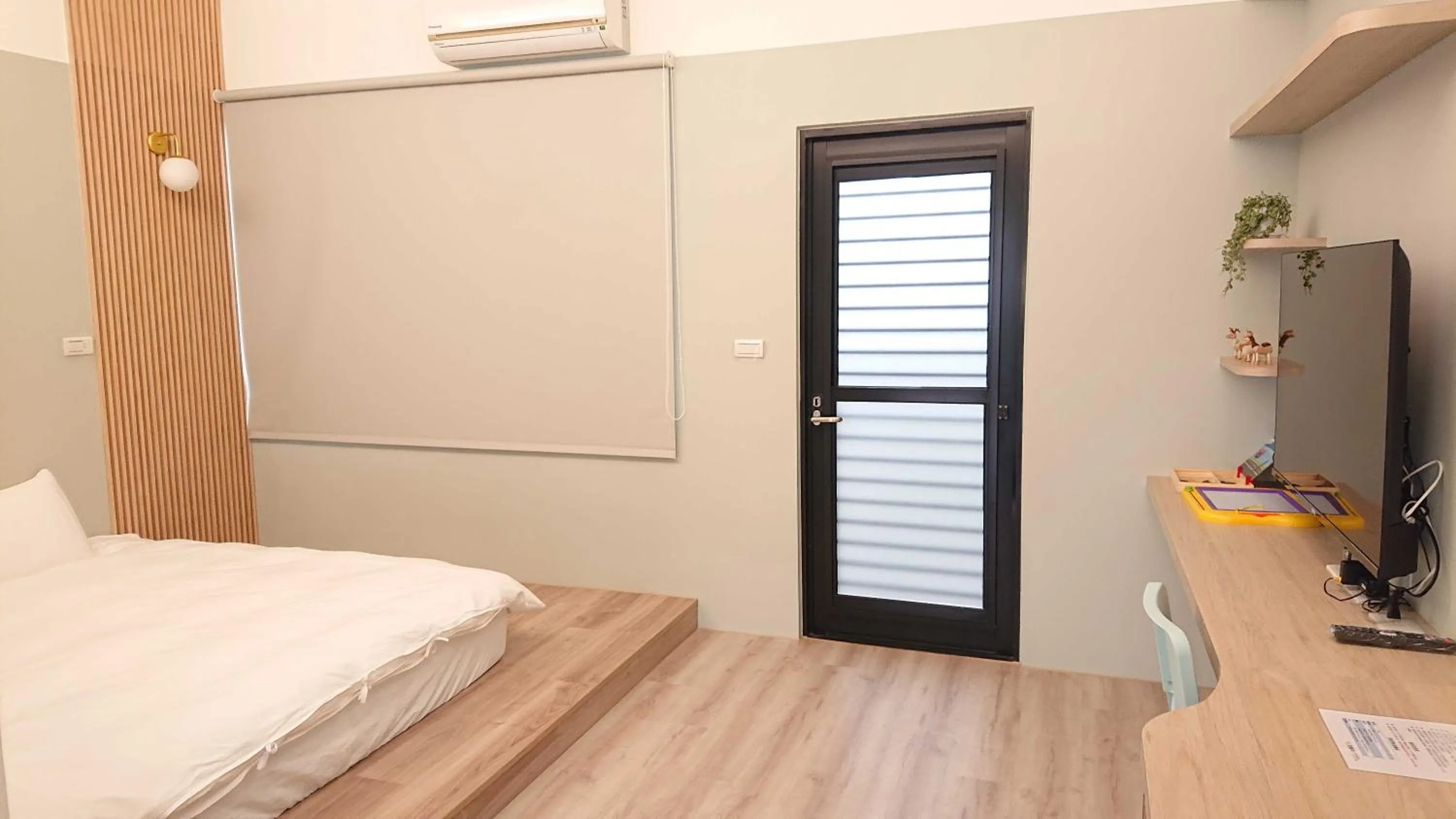 Bed in 胖蝸牛親子民宿