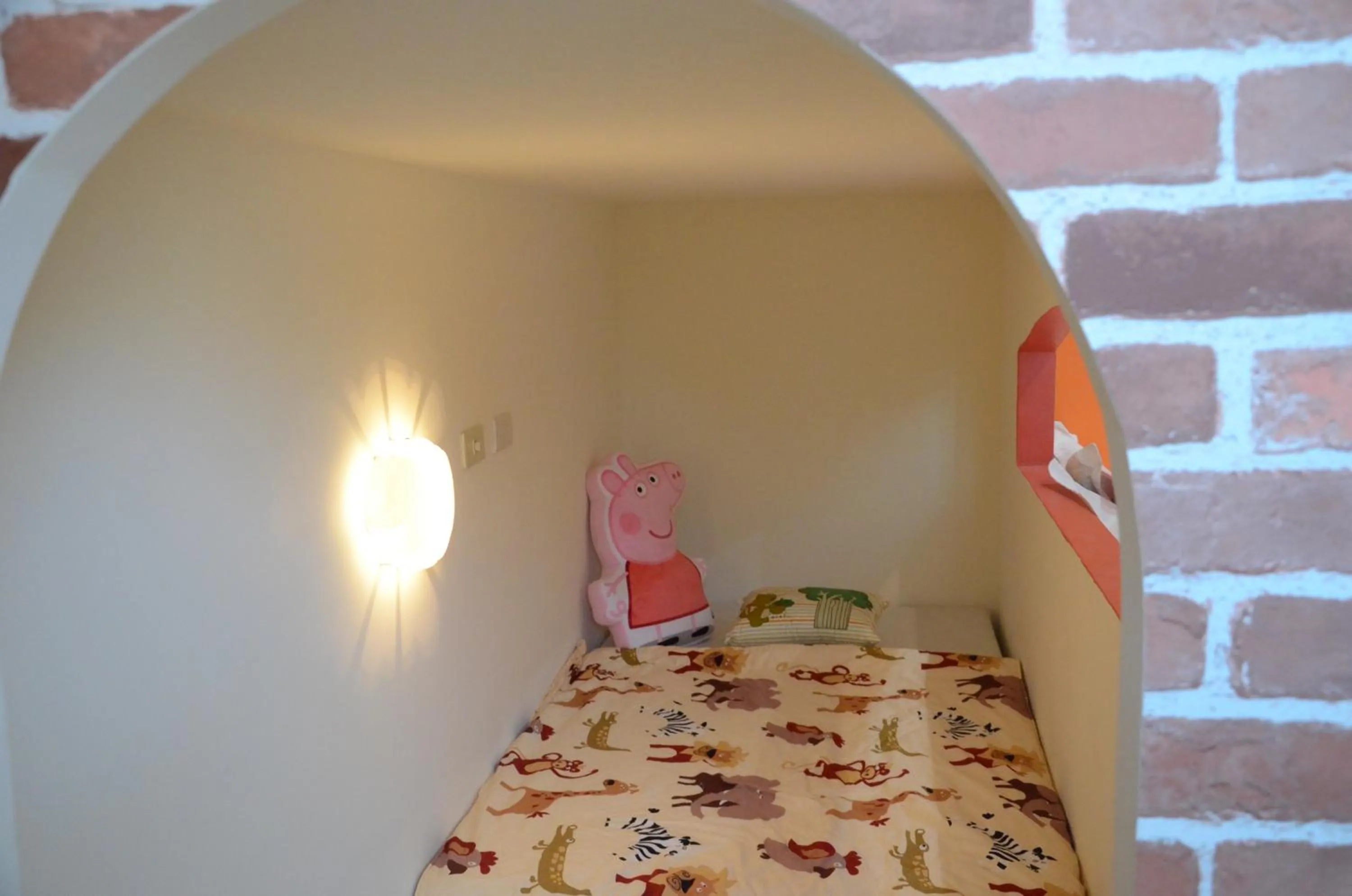 Bed in 胖蝸牛親子民宿