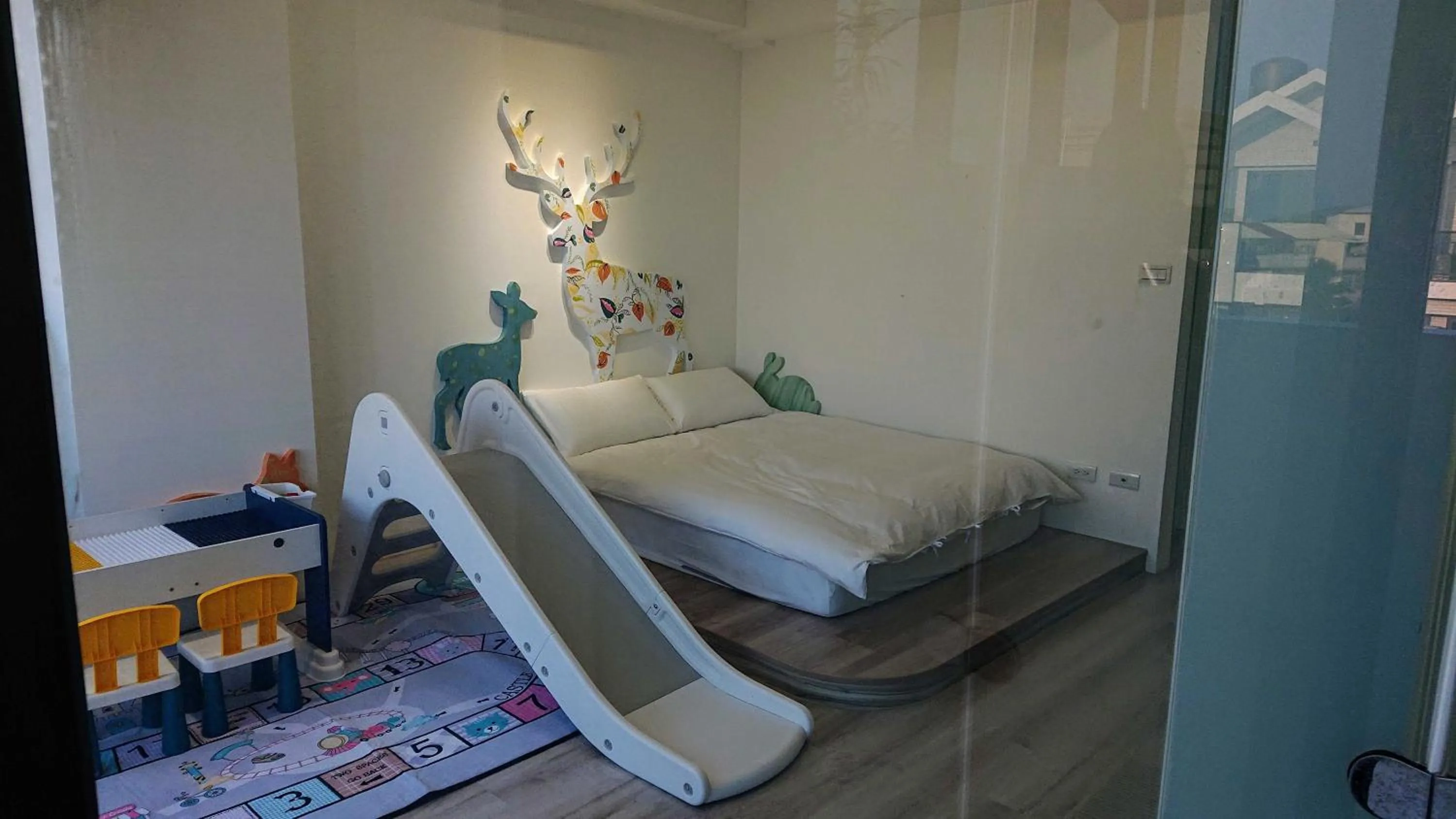 Photo of the whole room, Bed in 胖蝸牛親子民宿