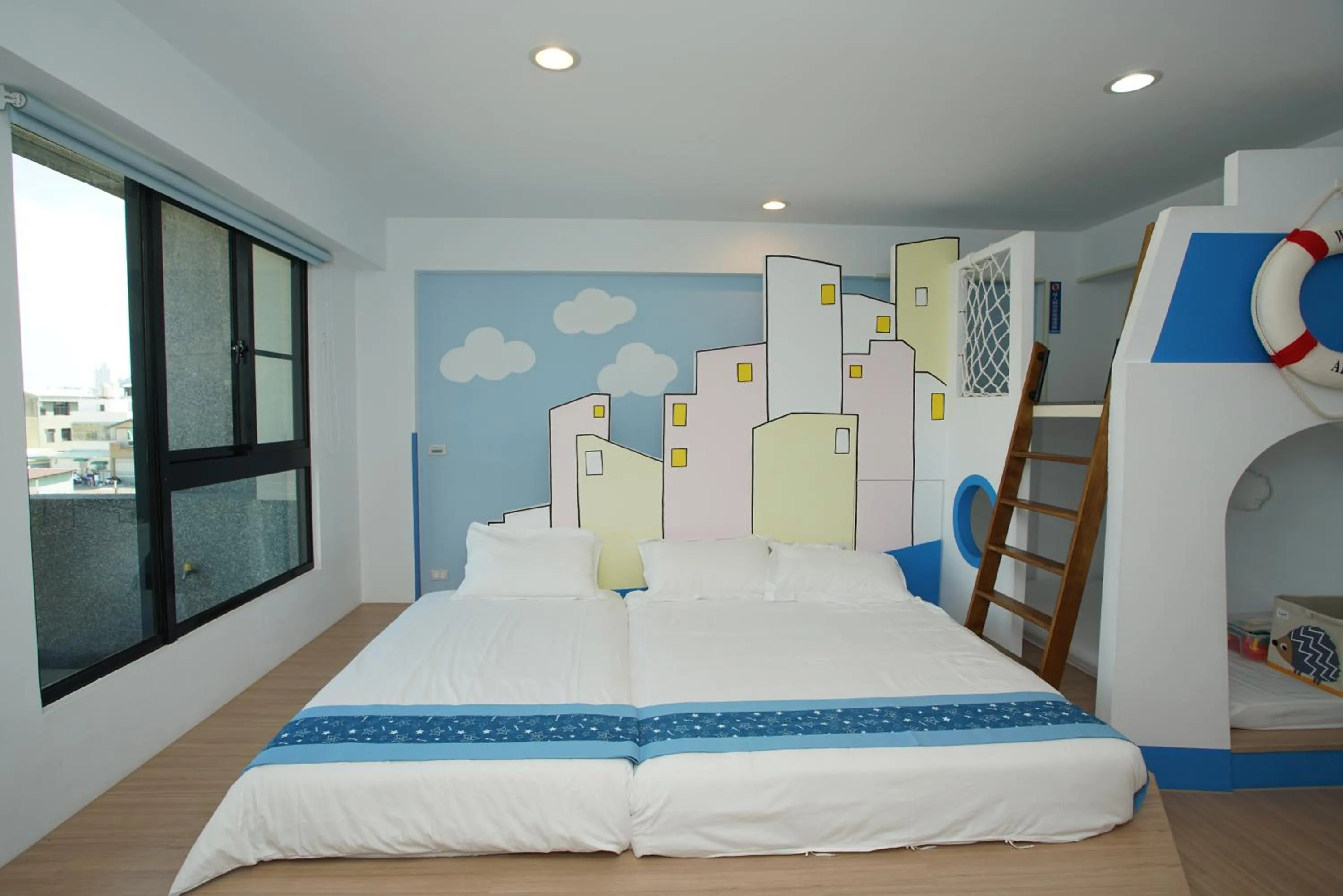 Bed in 胖蝸牛親子民宿