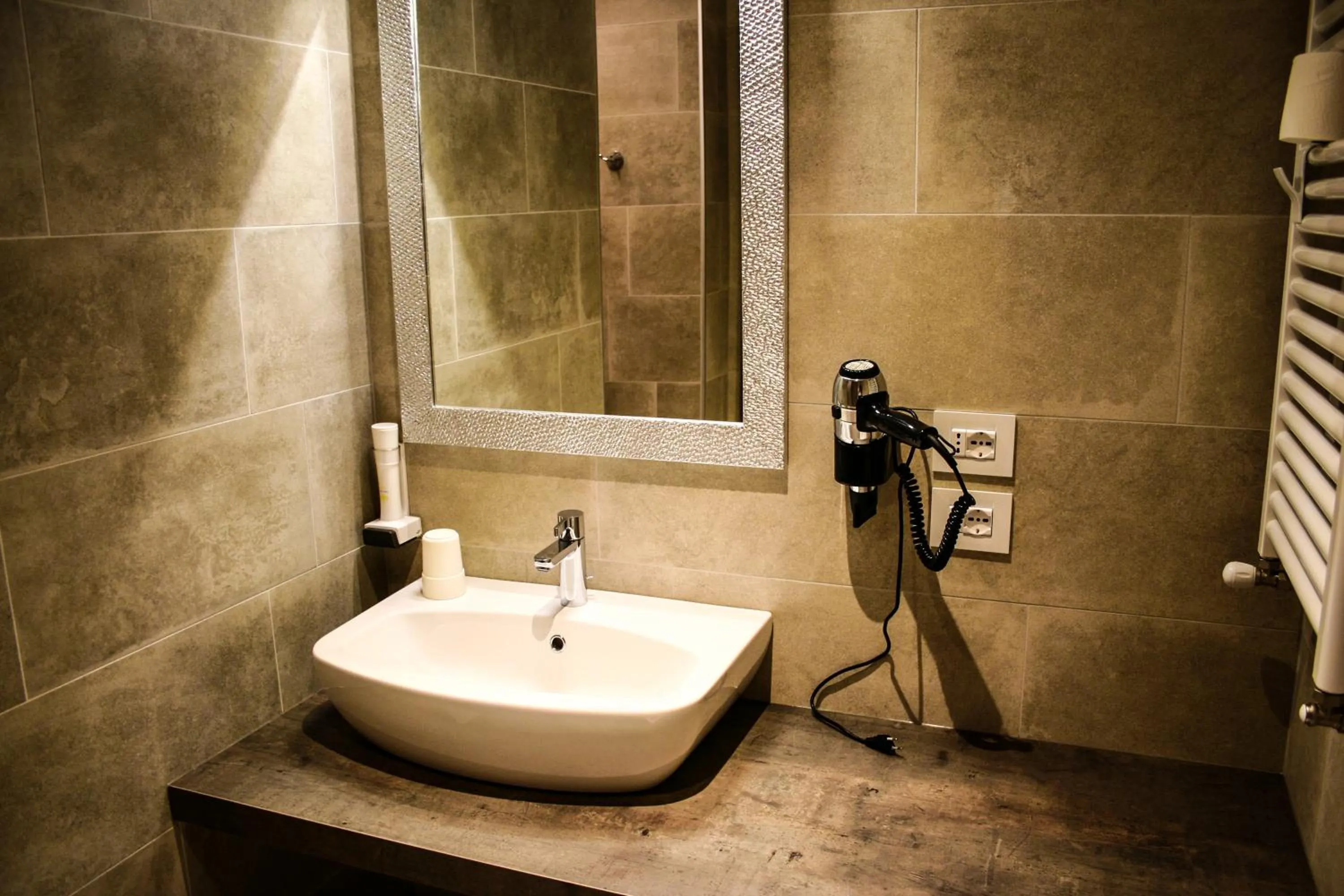 Bathroom in GardaBreak Rooms&Breakfast Holiday Apartments