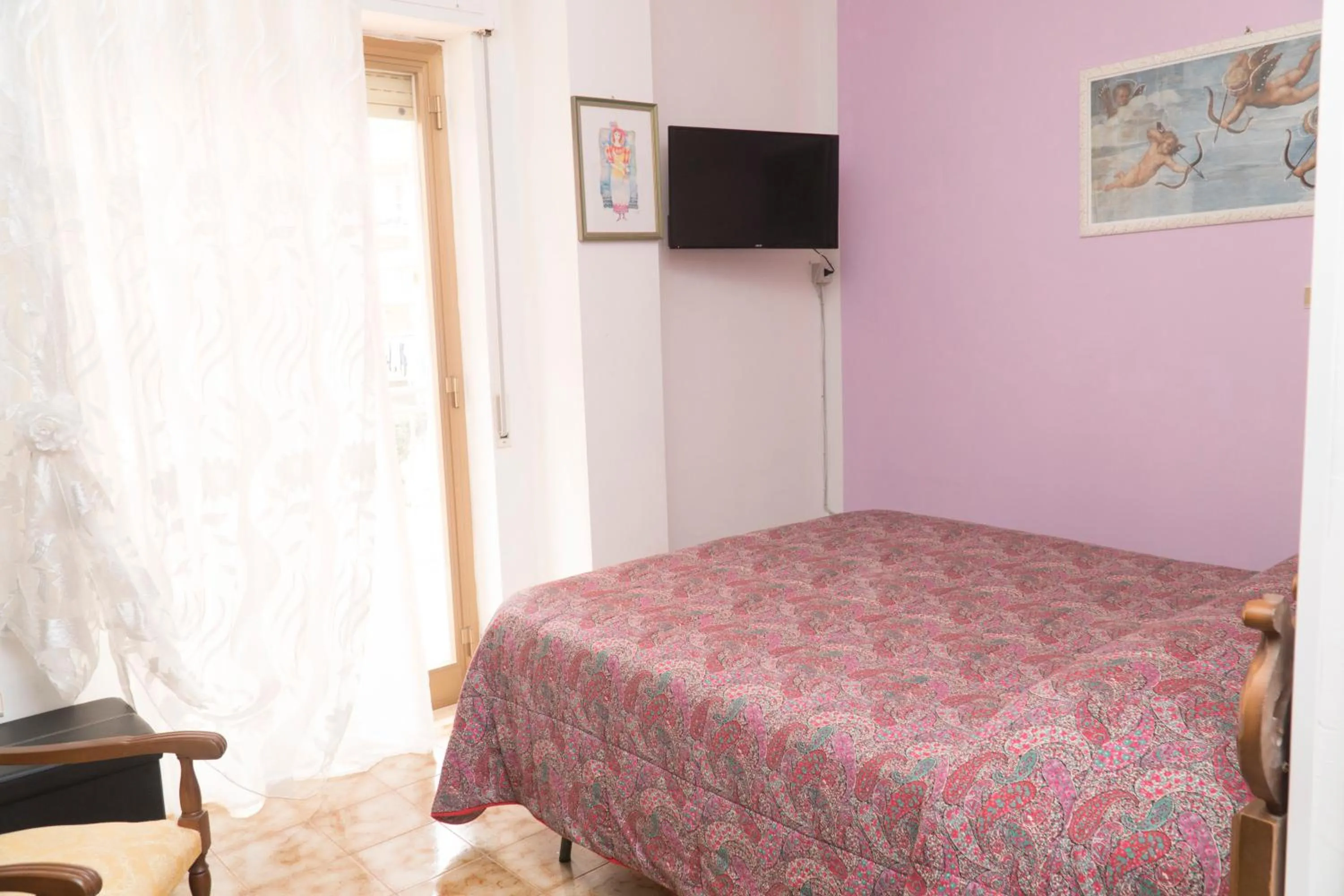 Bed in Le Gardenie b&b