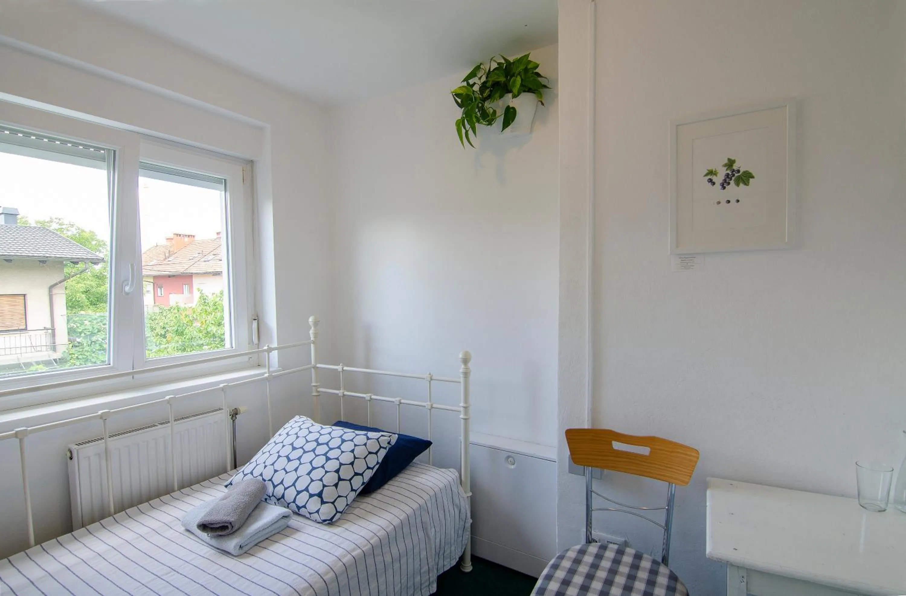 Bed in Family Guesthouse GreenSLO