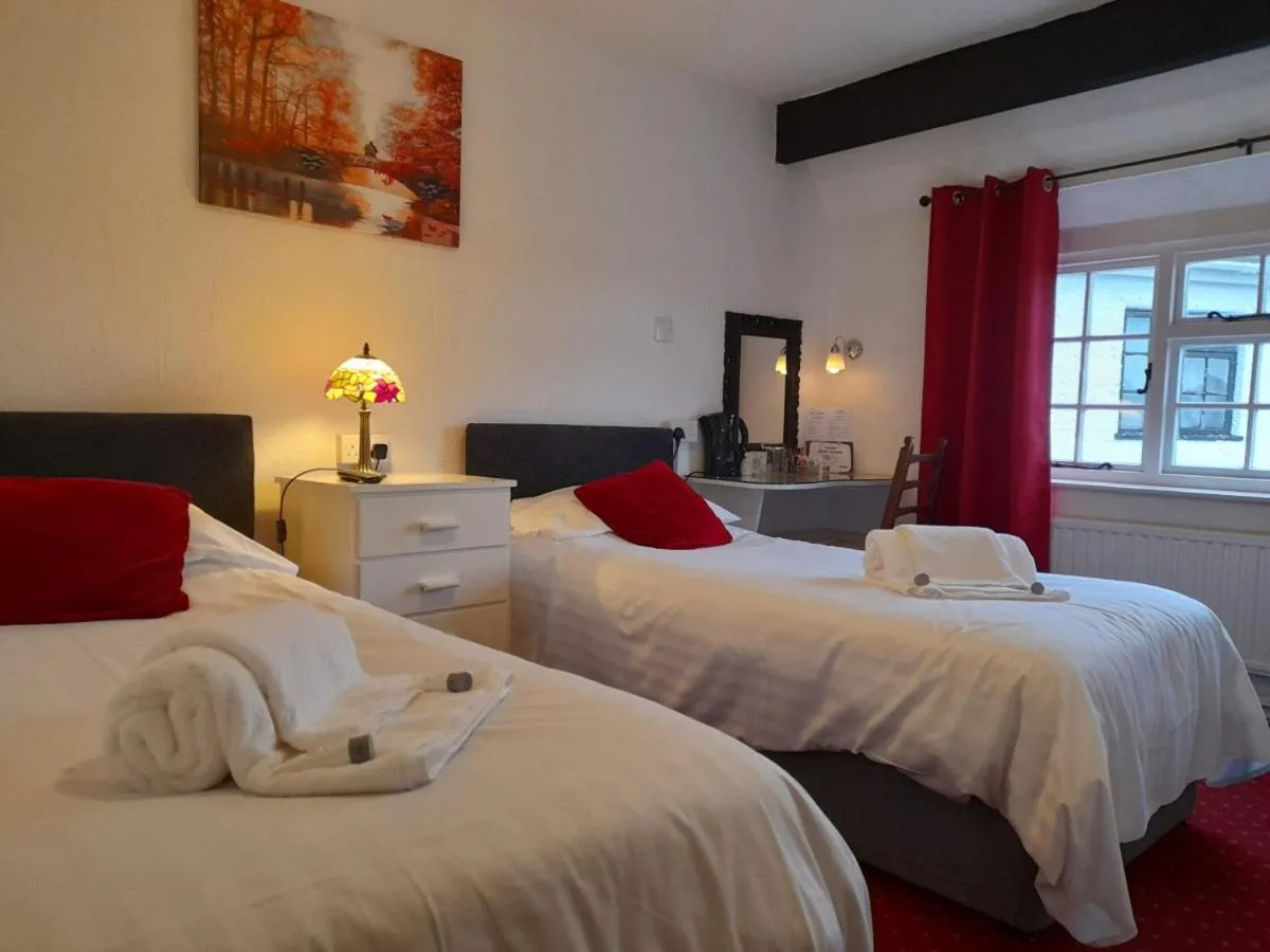 Bed in The Weary Friar Inn