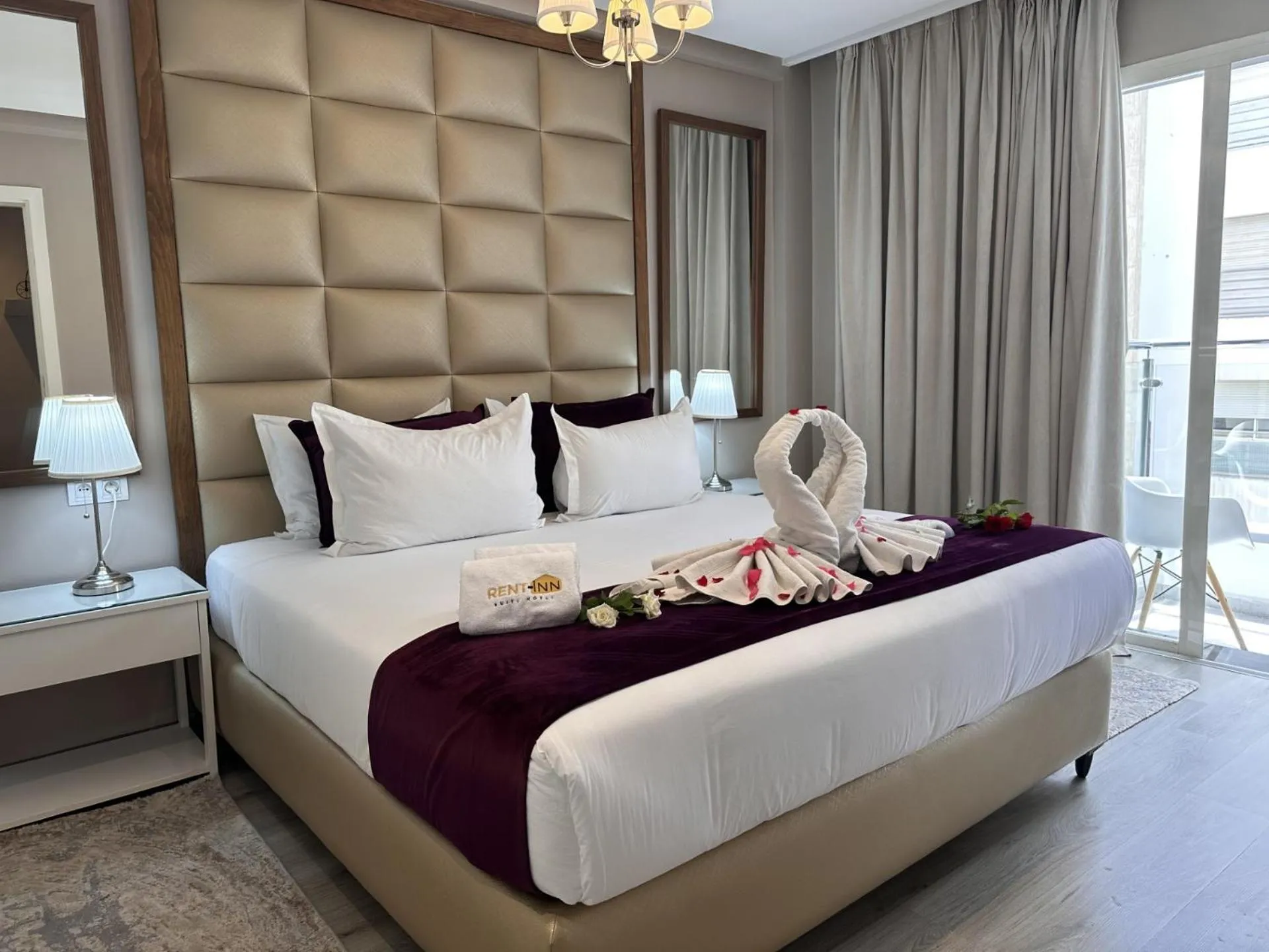 Bed in RENT-INN Suites Hotel