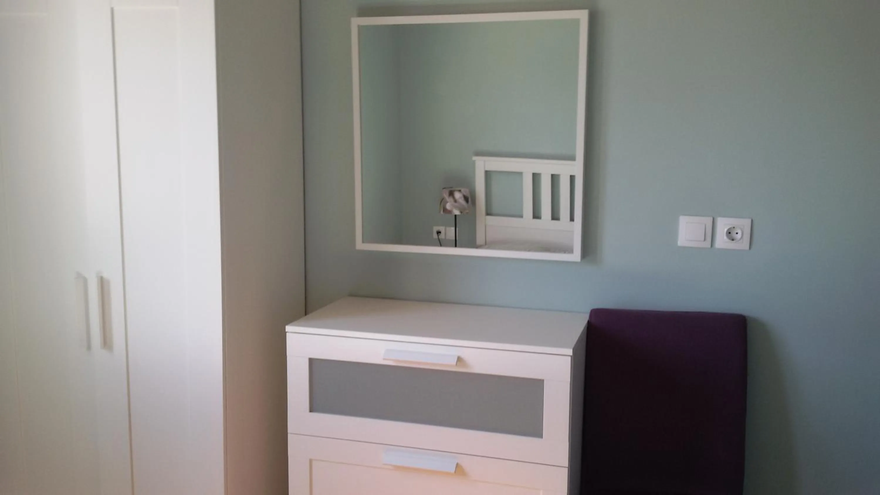 Bedroom in Shambala Apartments