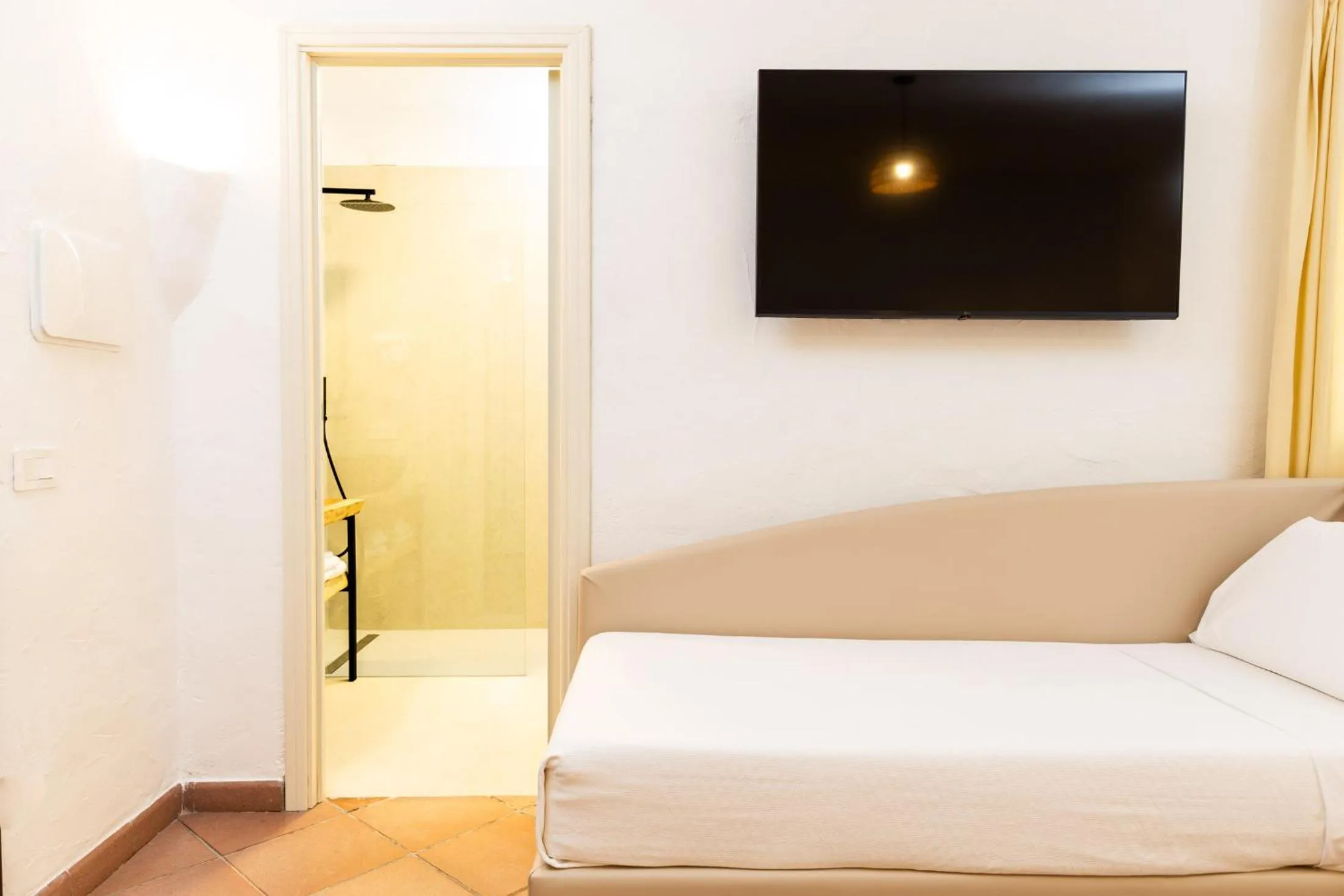 Bed in La Jacia Hotel & Resort