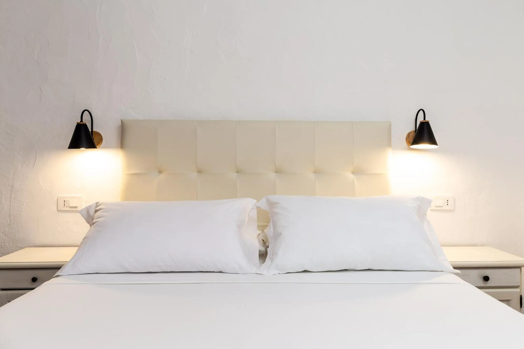 Bed in La Jacia Hotel & Resort