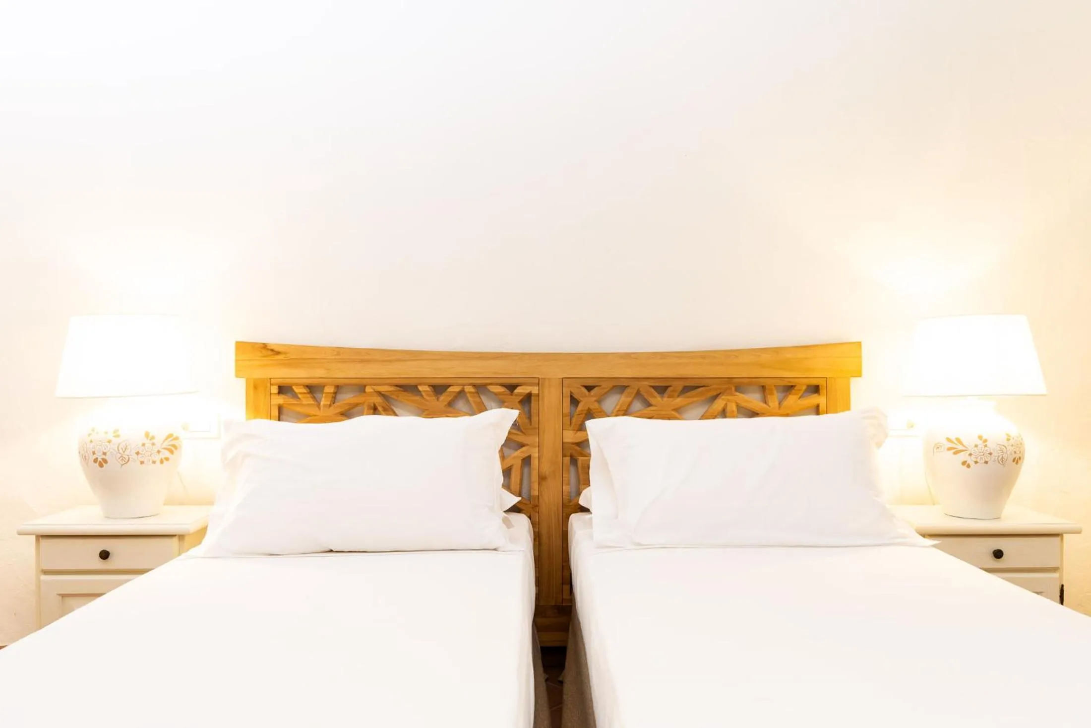 Bed in La Jacia Hotel & Resort
