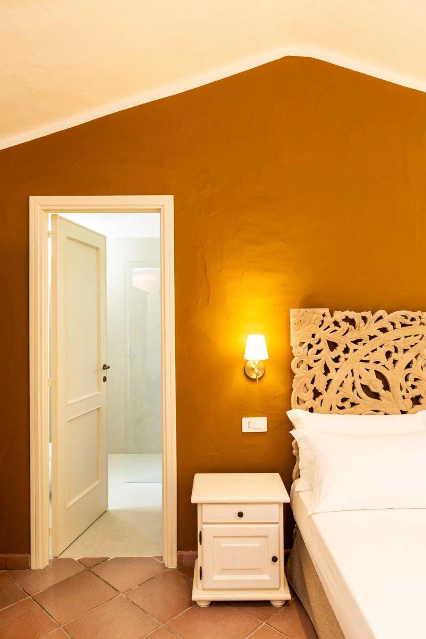 Bed in La Jacia Hotel & Resort