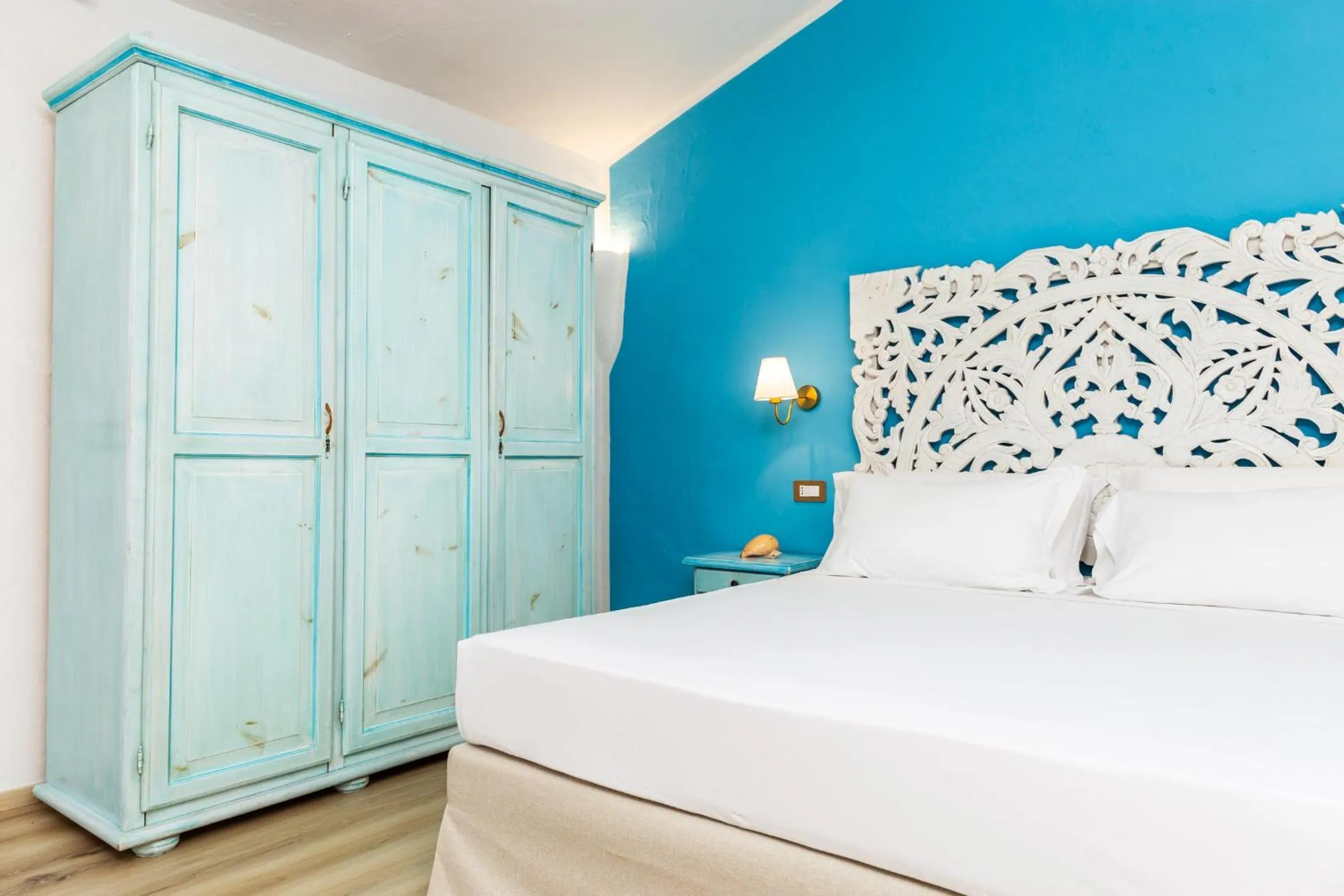 Bed in La Jacia Hotel & Resort