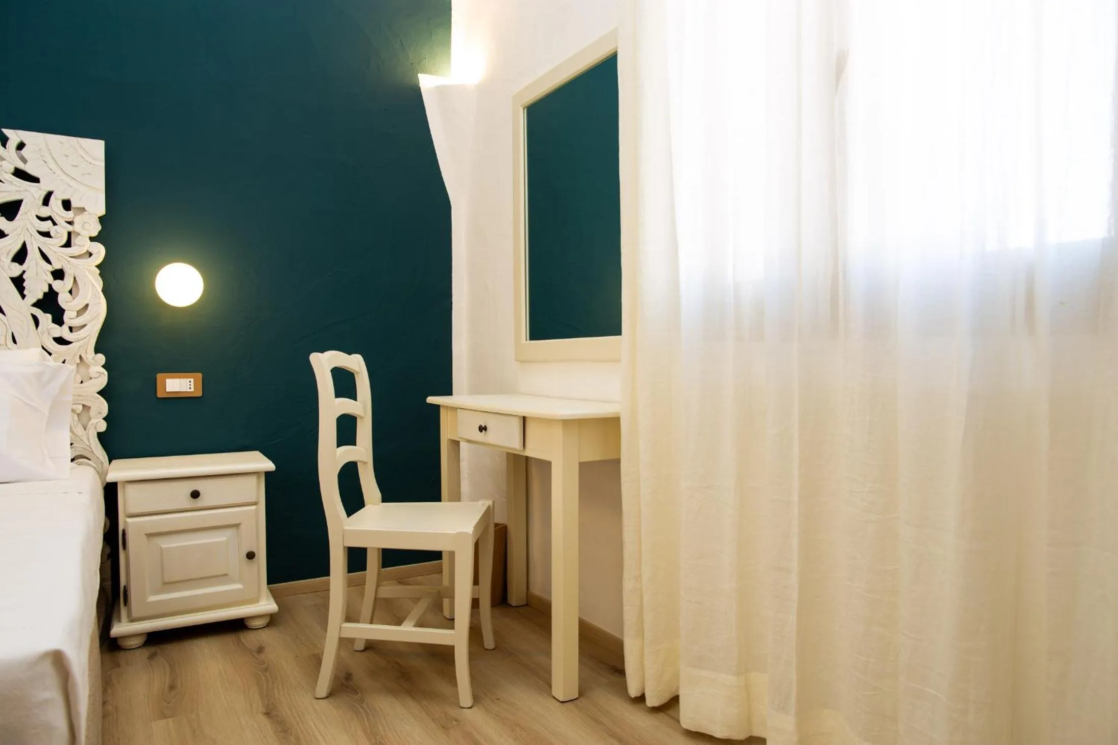 Bed in La Jacia Hotel & Resort