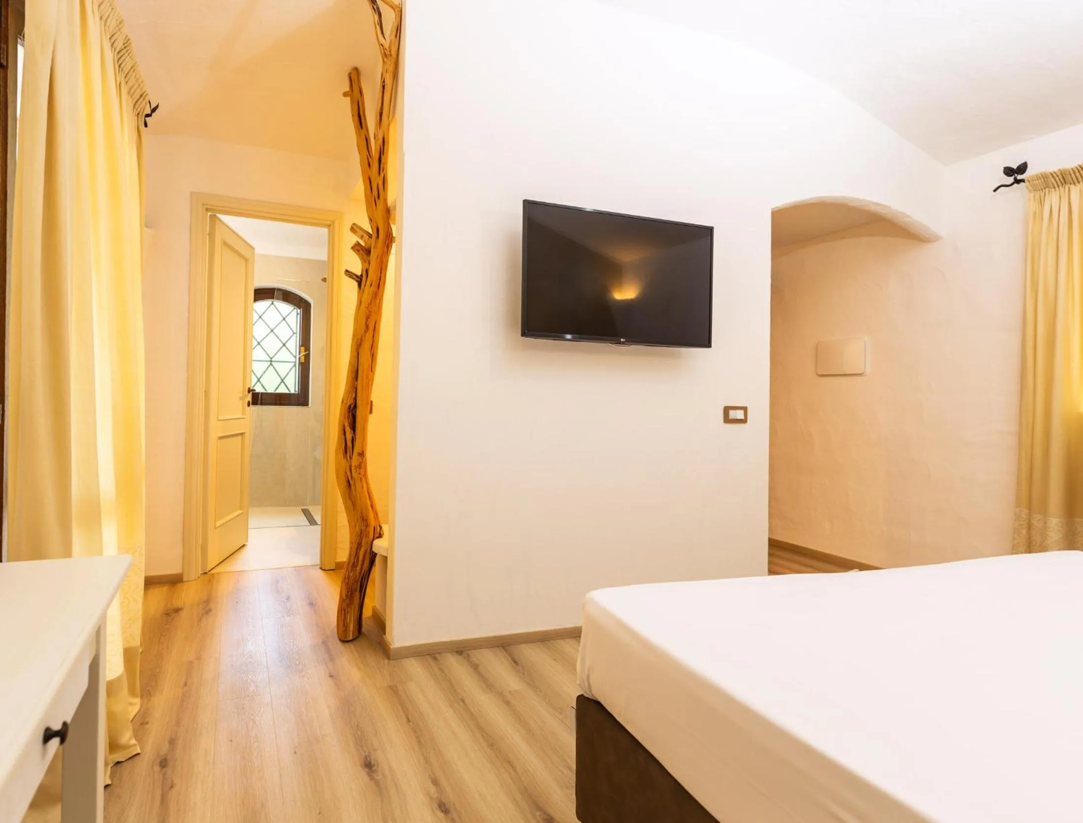 Bed in La Jacia Hotel & Resort