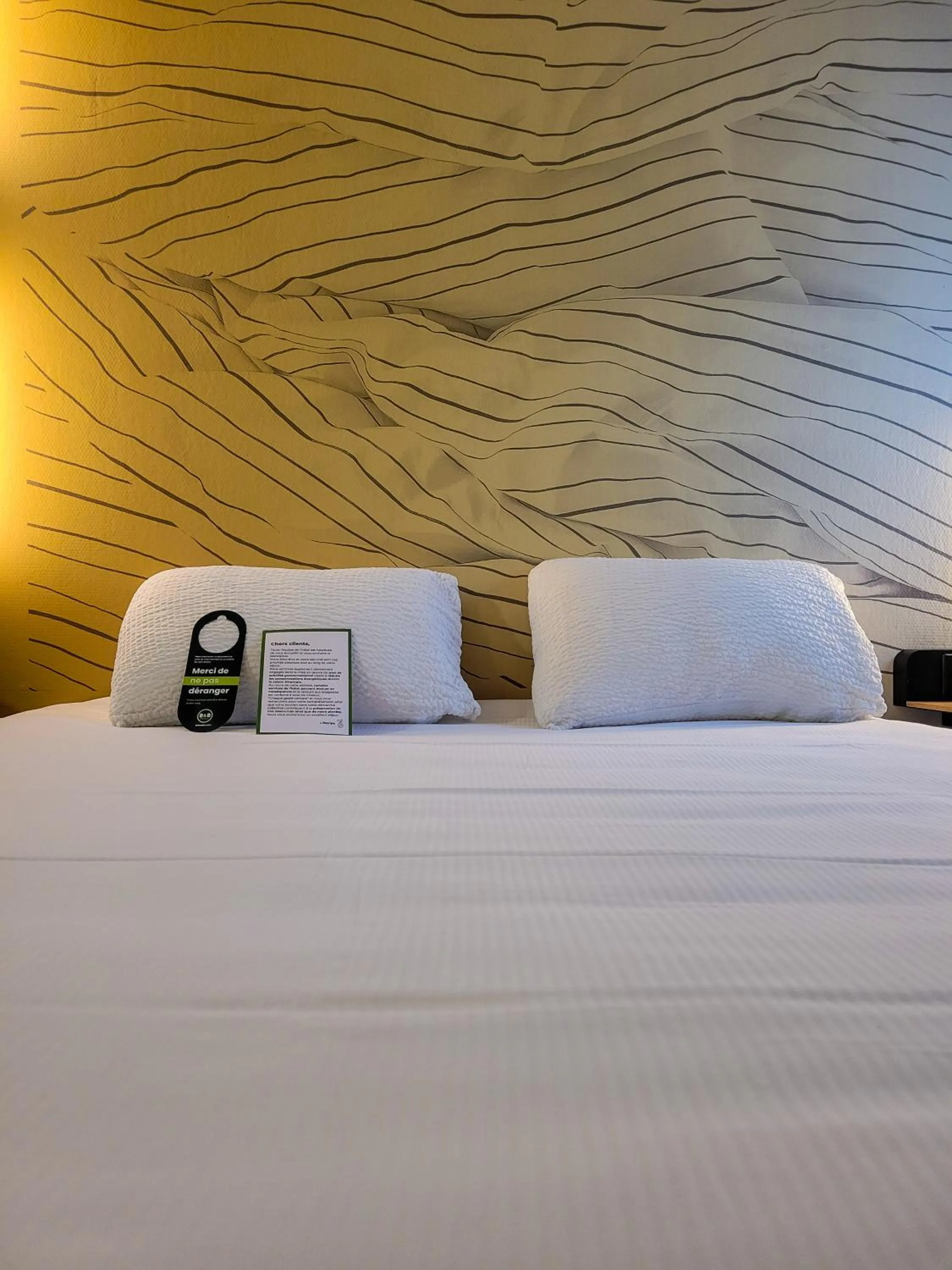 Bed in B&B HOTEL Aurillac Le Lioran