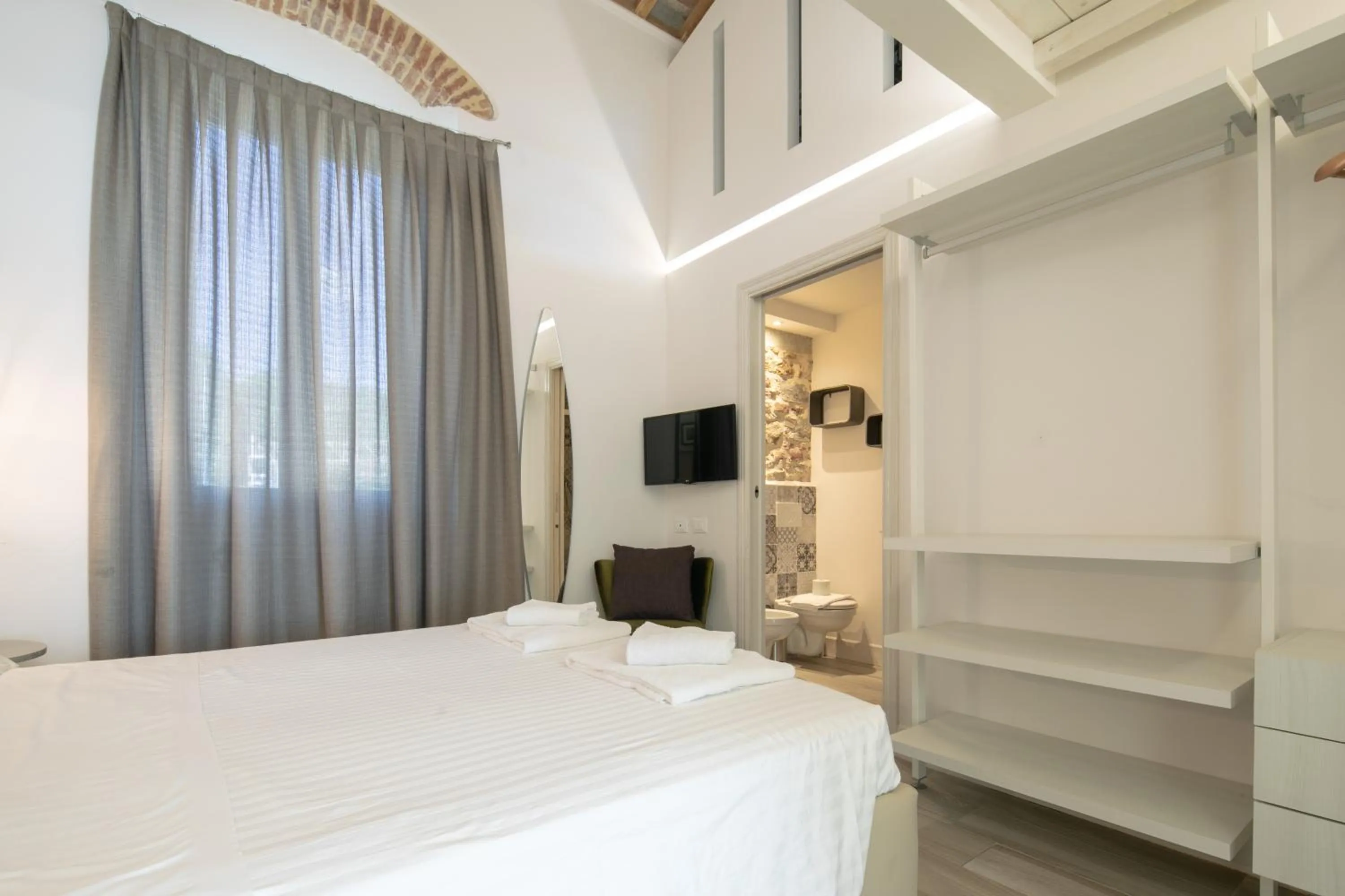 Bed in Giglio Apartments by Mmega
