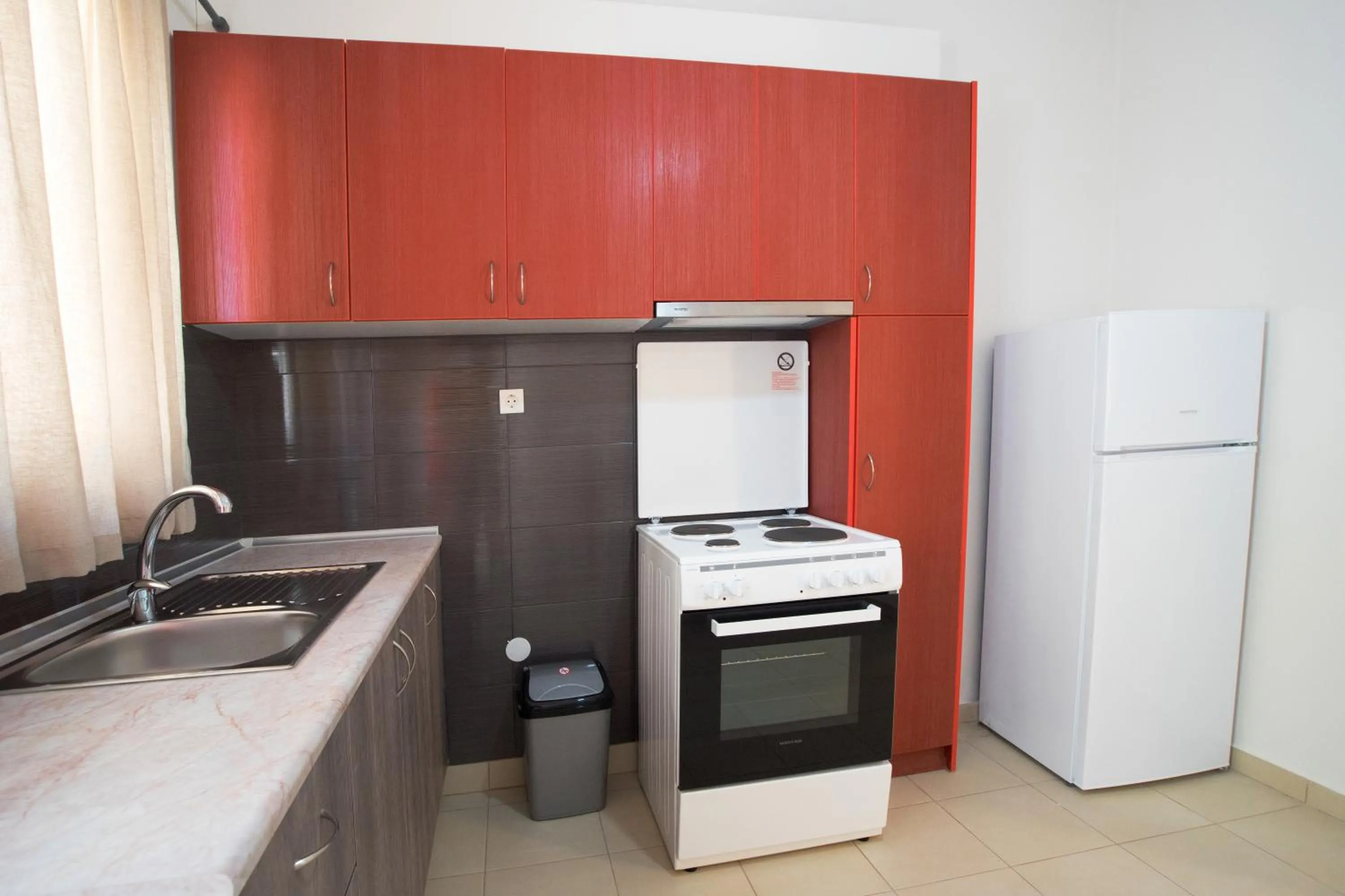Kitchen or kitchenette in Naiades Luxury Apartments
