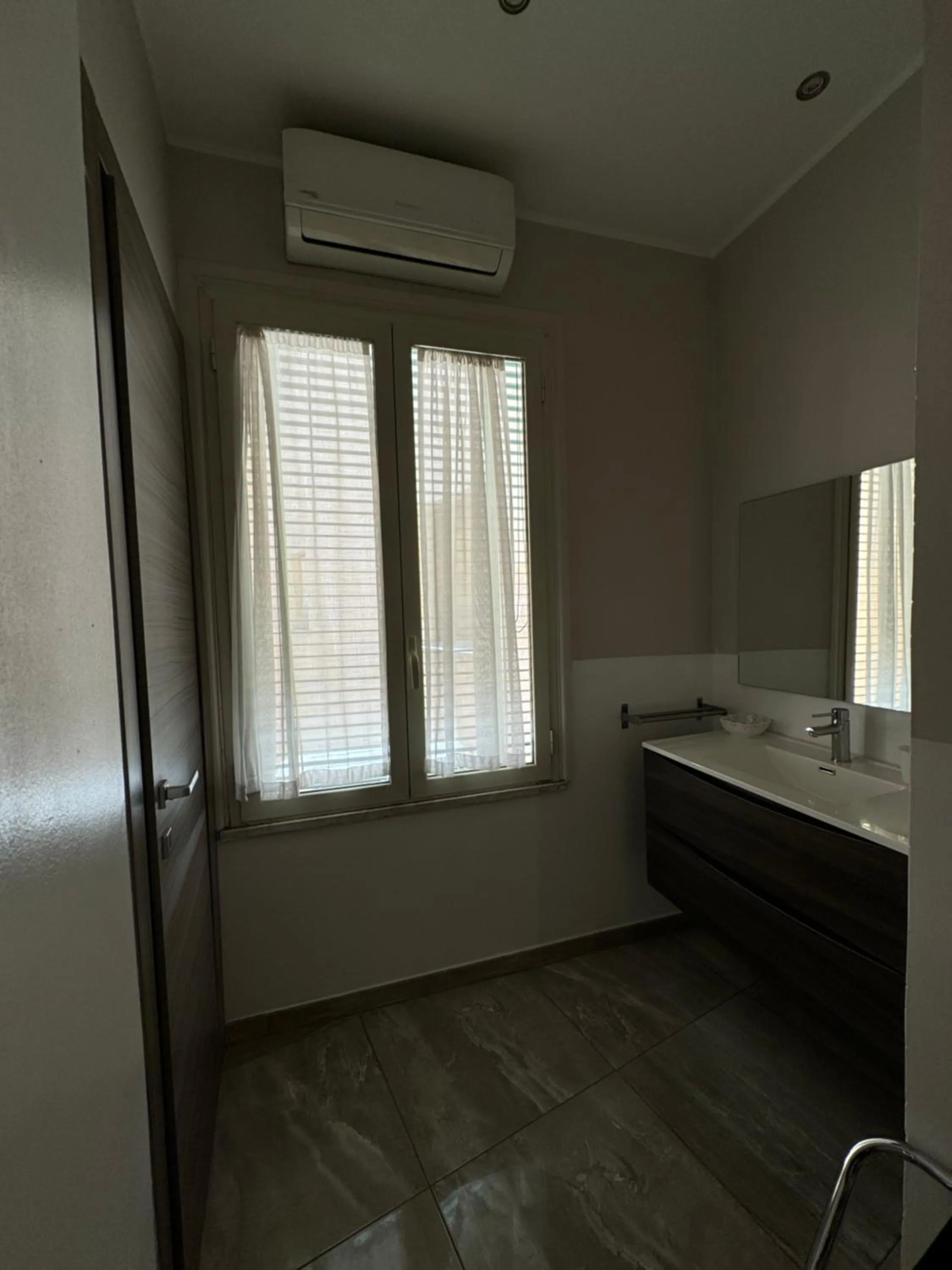 Bathroom in RHS Rienzo Suites