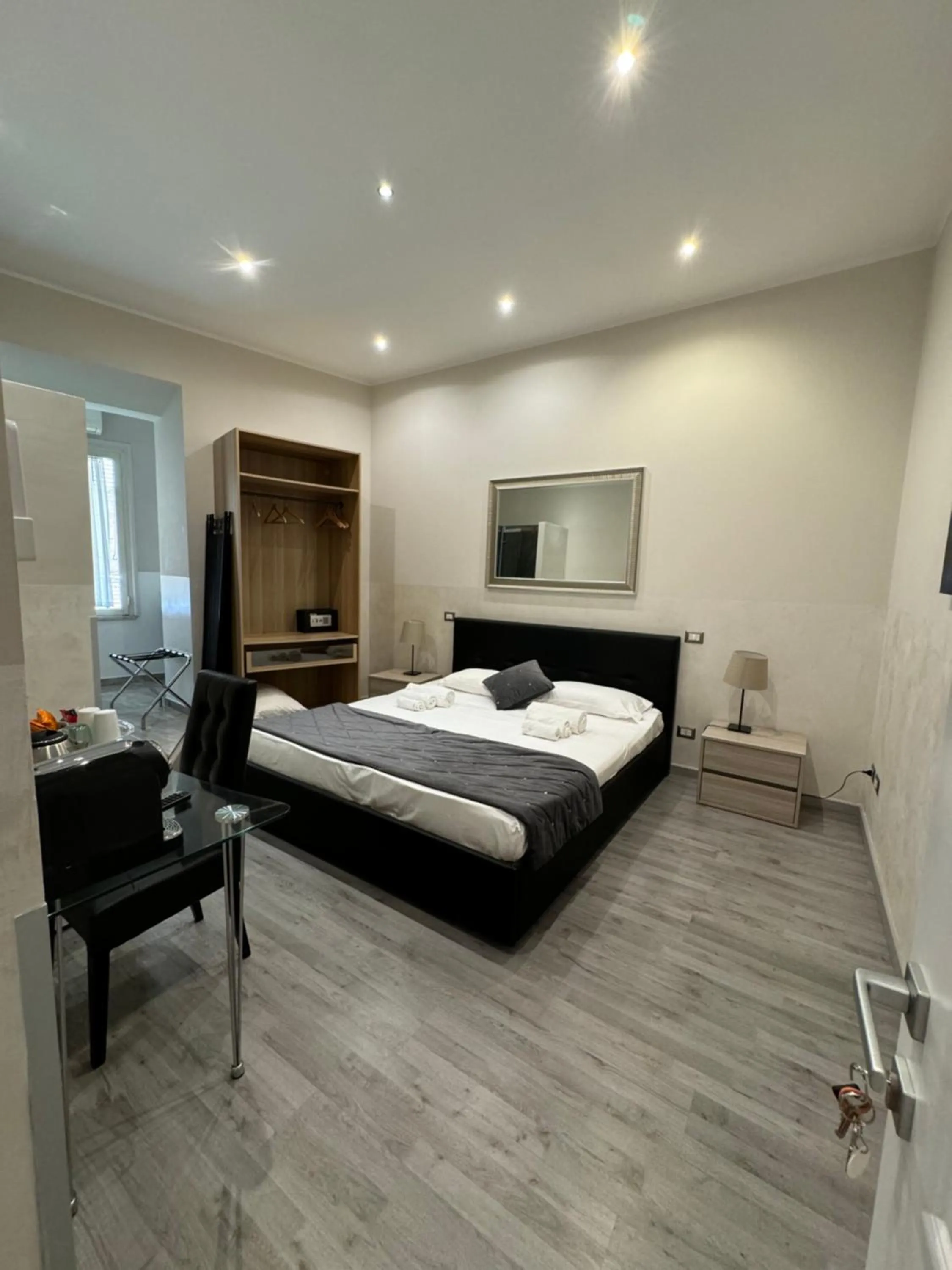 Bed in RHS Rienzo Suites