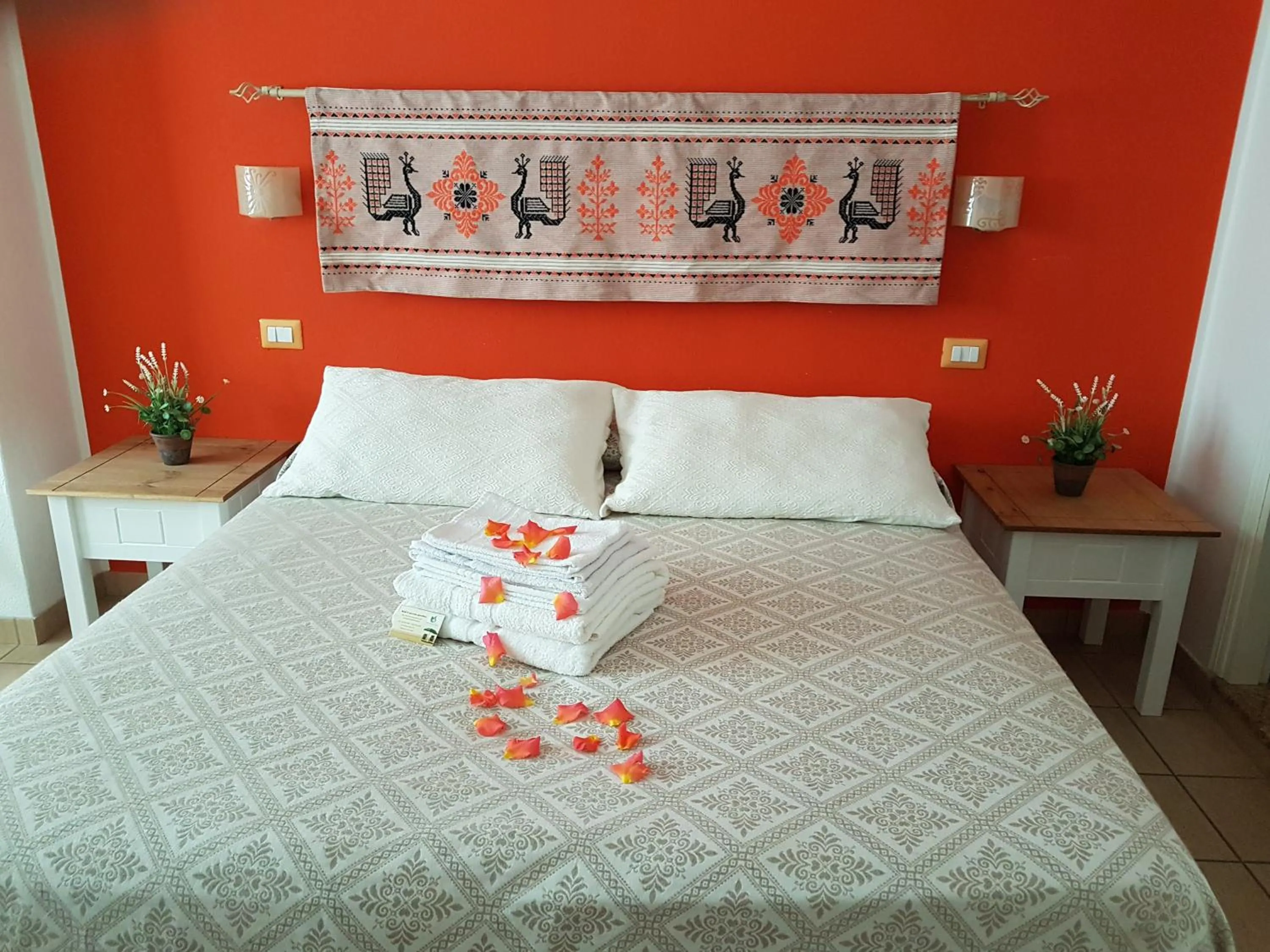 Bedroom in Il Piccolo Giardino rooms & breakfast