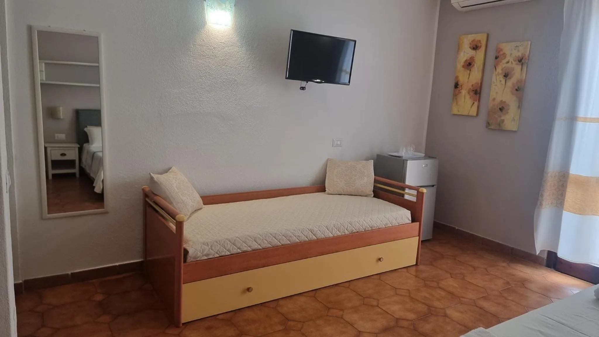 Bedroom in Il Piccolo Giardino rooms & breakfast