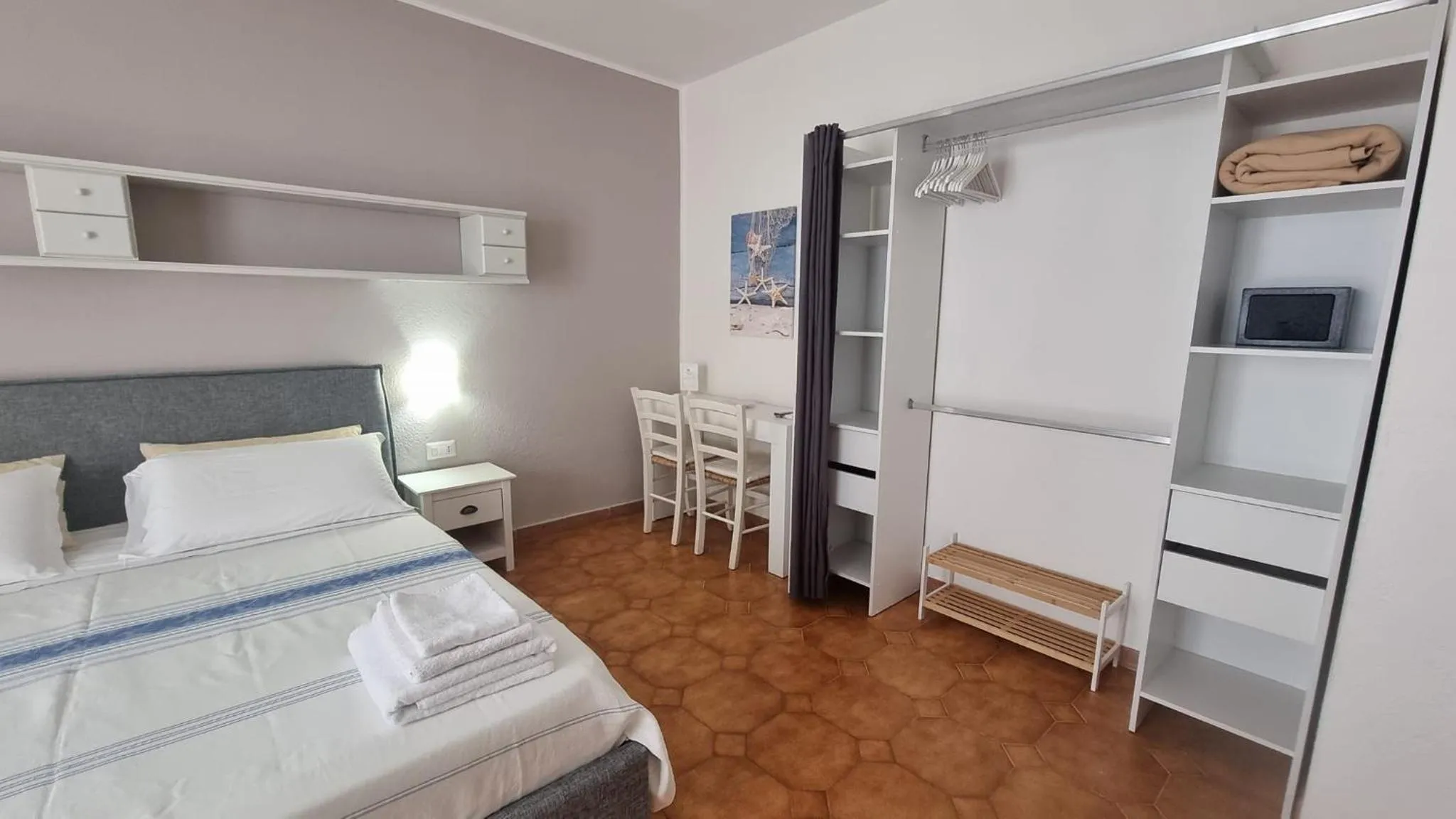 Bedroom in Il Piccolo Giardino rooms & breakfast