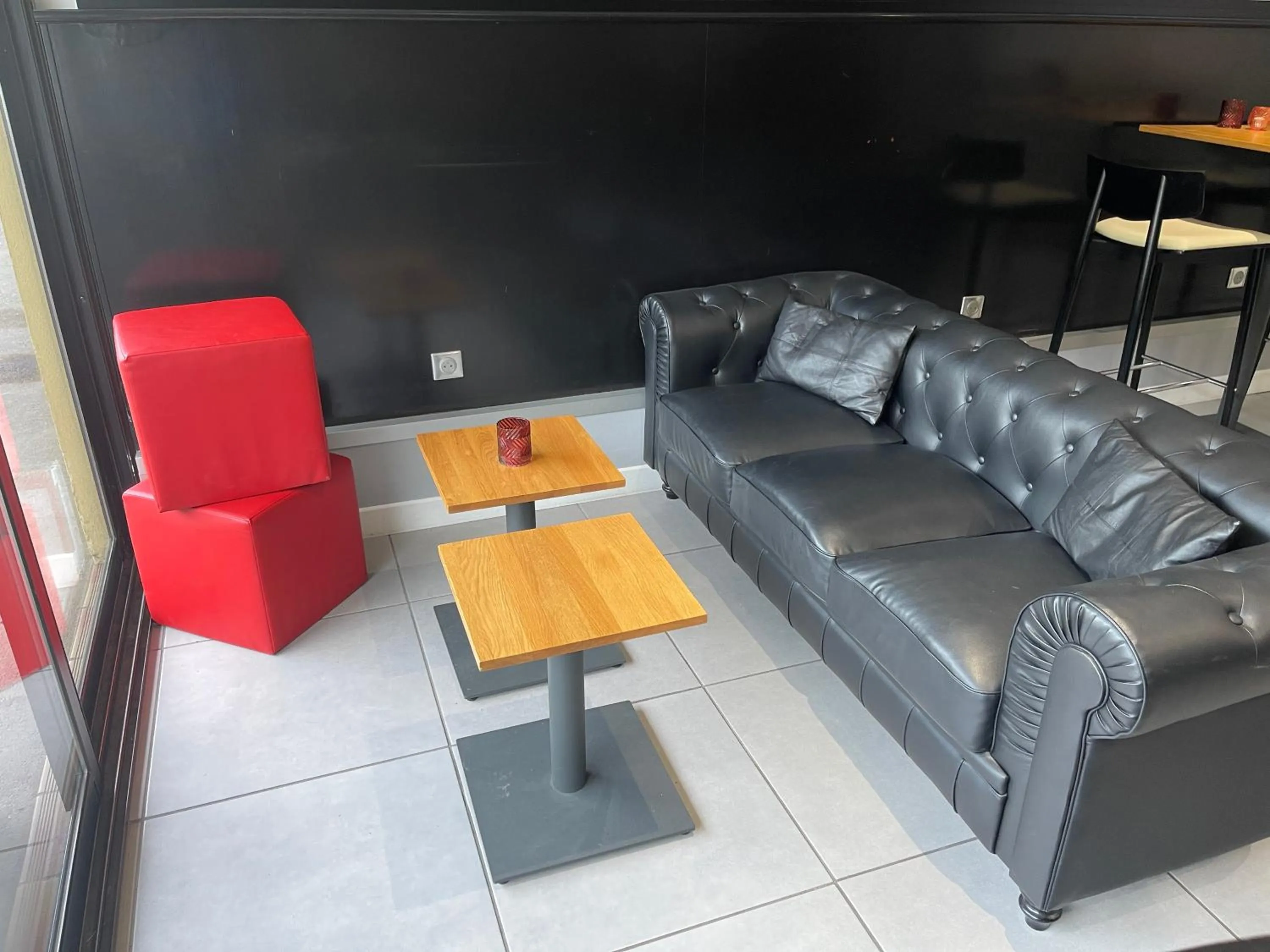 Living room in Cit'Hôtel le Welcome