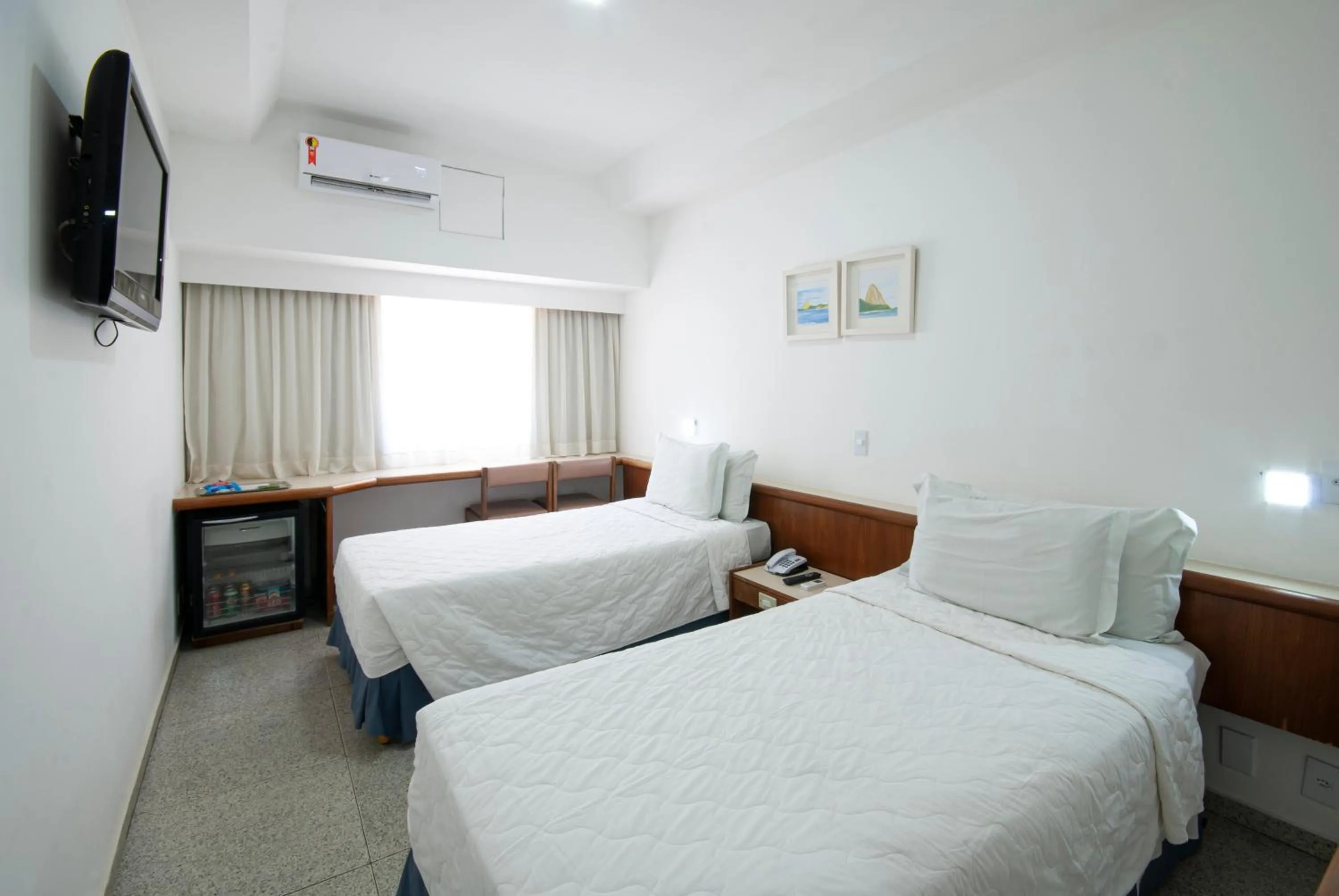 Bed in Hotel Bandeirantes