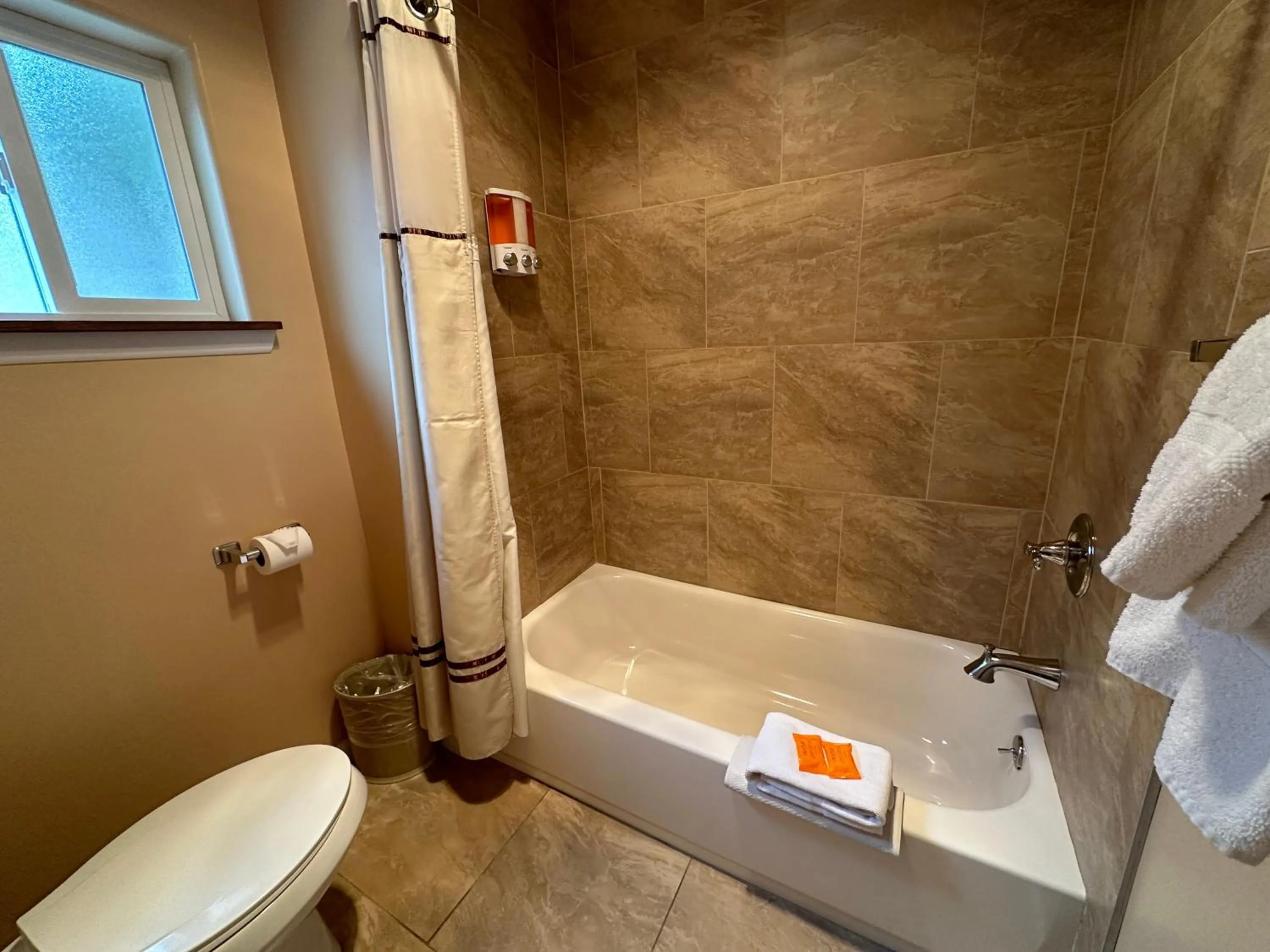 Bathroom in Abram Inn & Suites