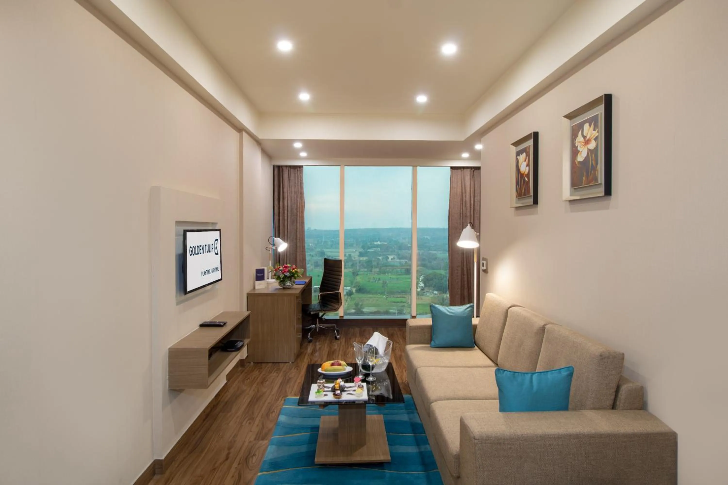 Living room in Golden Suites Gurgaon Inde Hotels