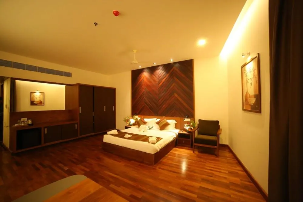Bed in Woodies Bleisure Hotel