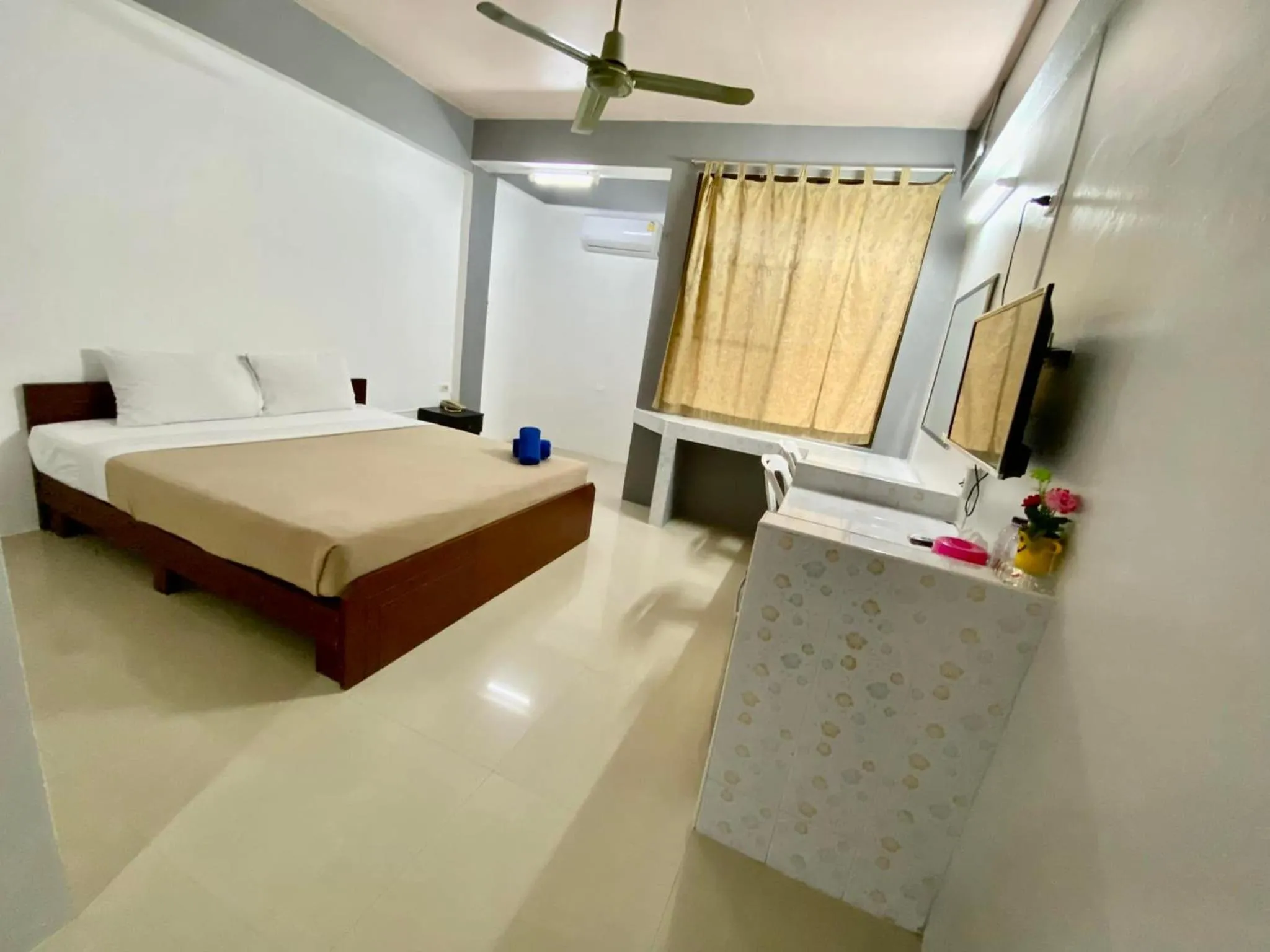 Bed in Pasawang Hotel (โรงแรมภาสว่าง)