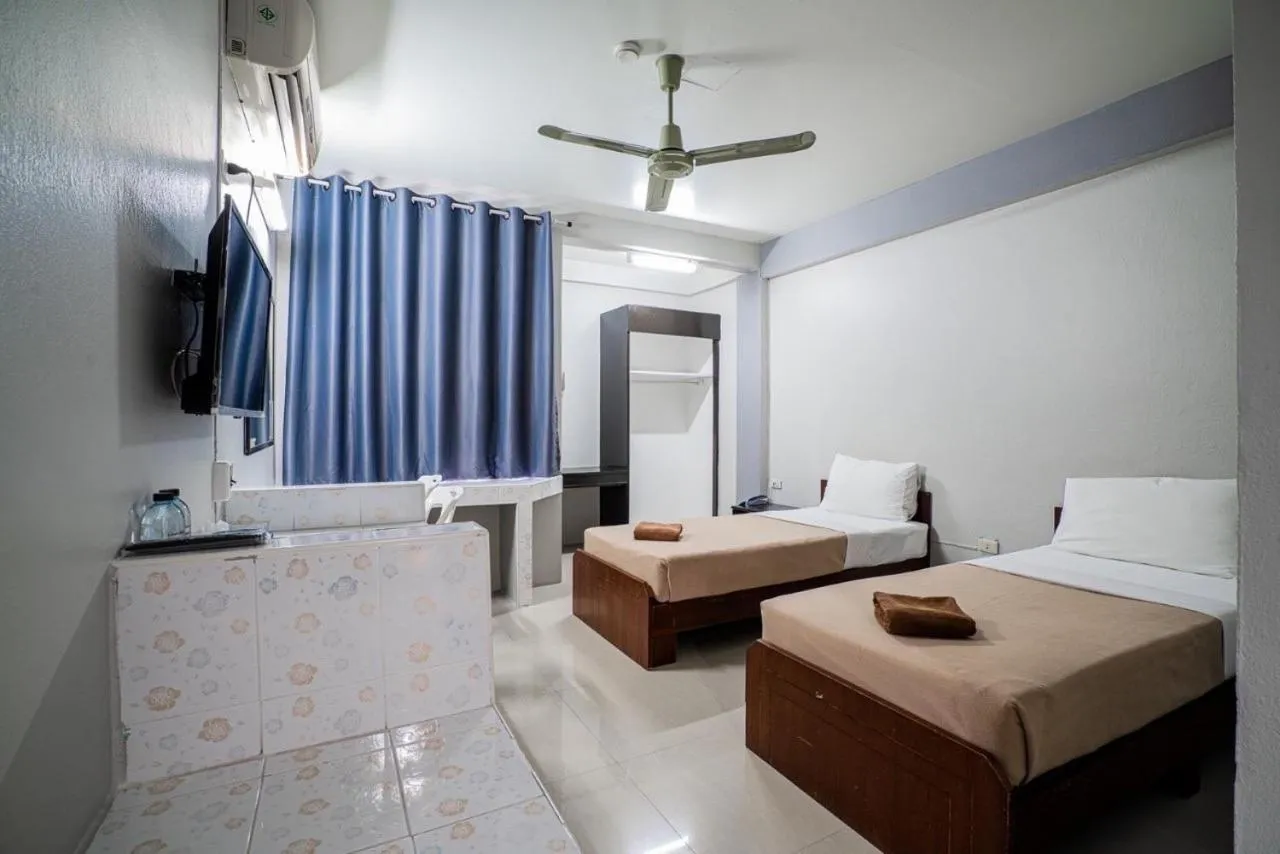 Bed in Pasawang Hotel (โรงแรมภาสว่าง)