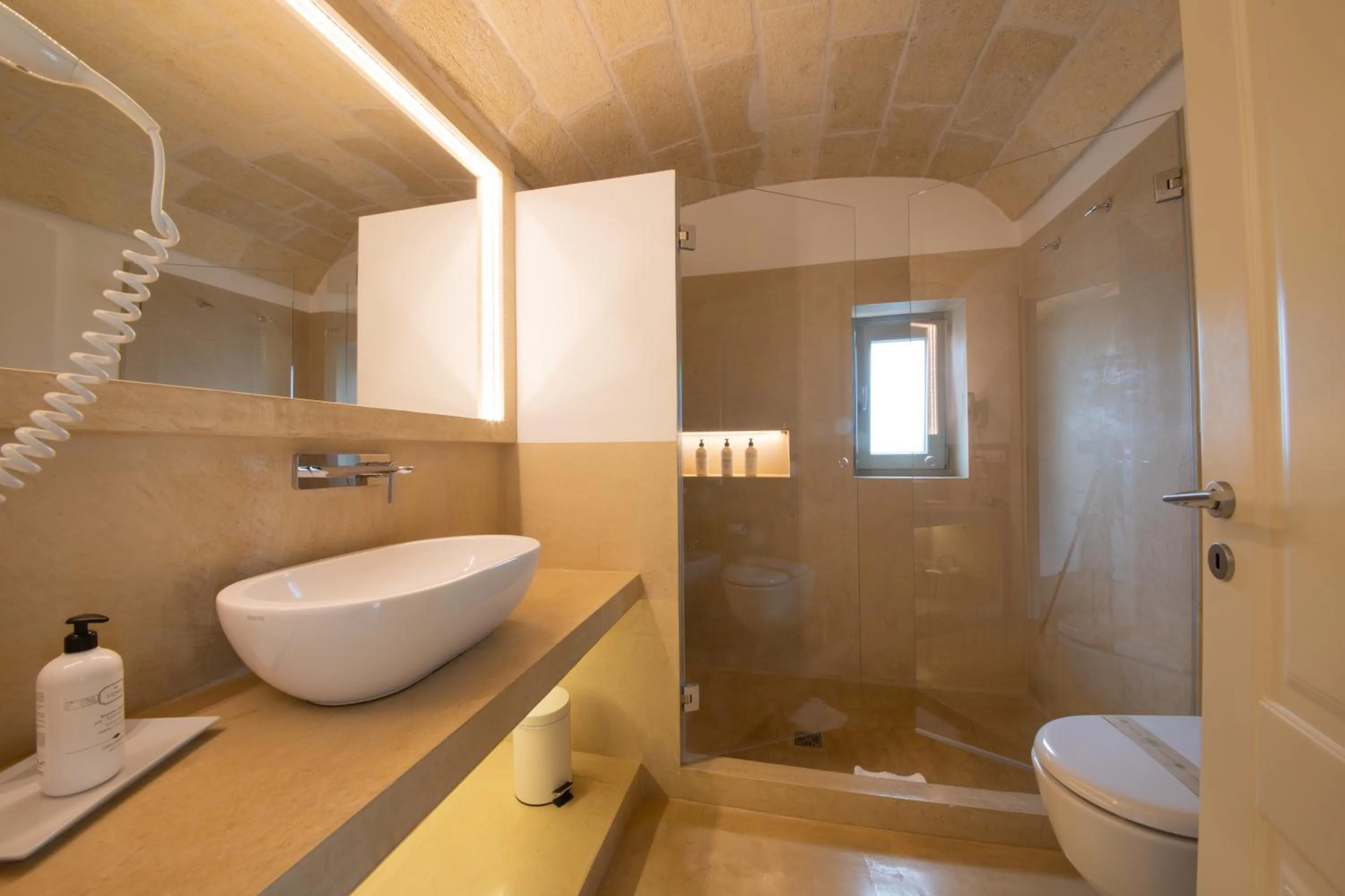 Shower in Masseriola Antiche Fogge by Apulia Hospitality