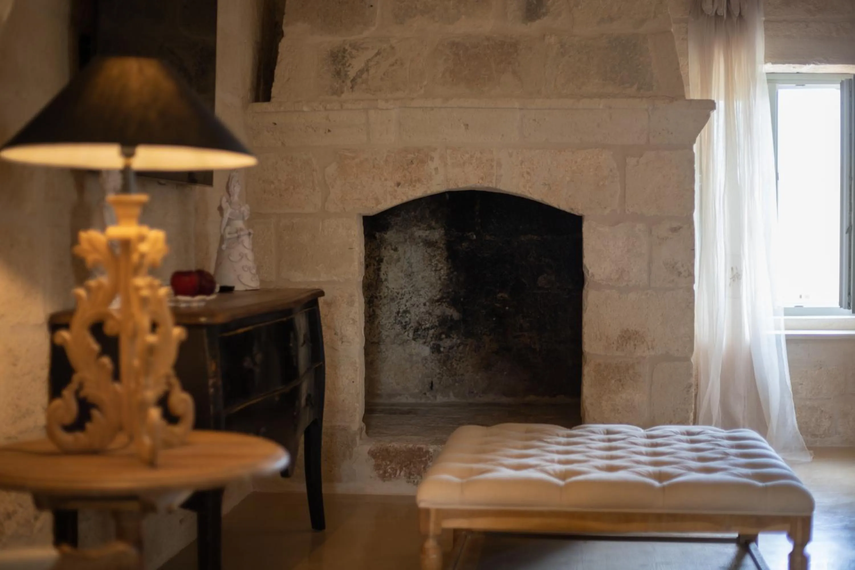 fireplace in Masseriola Antiche Fogge by Apulia Hospitality