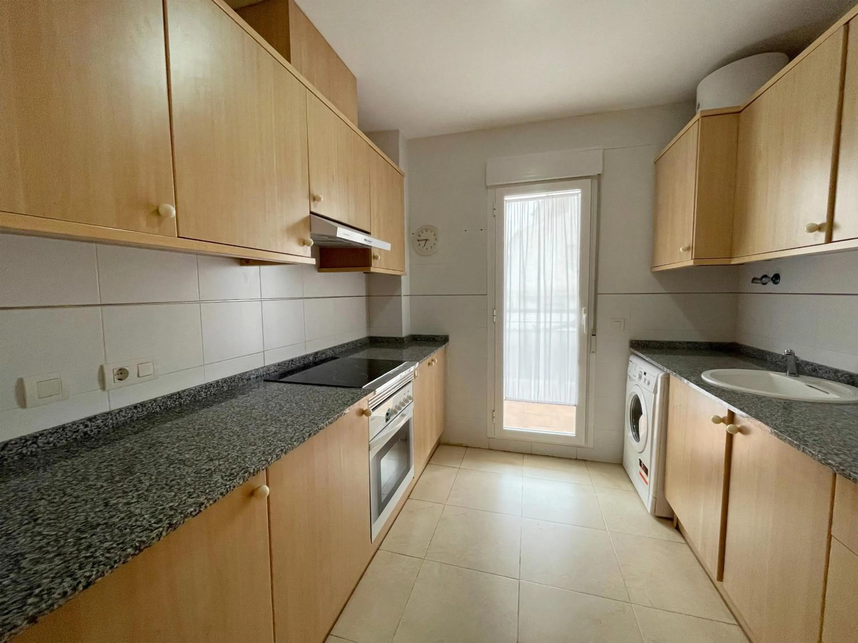 Kitchen or kitchenette in Apartamentos Los Almendros 3000