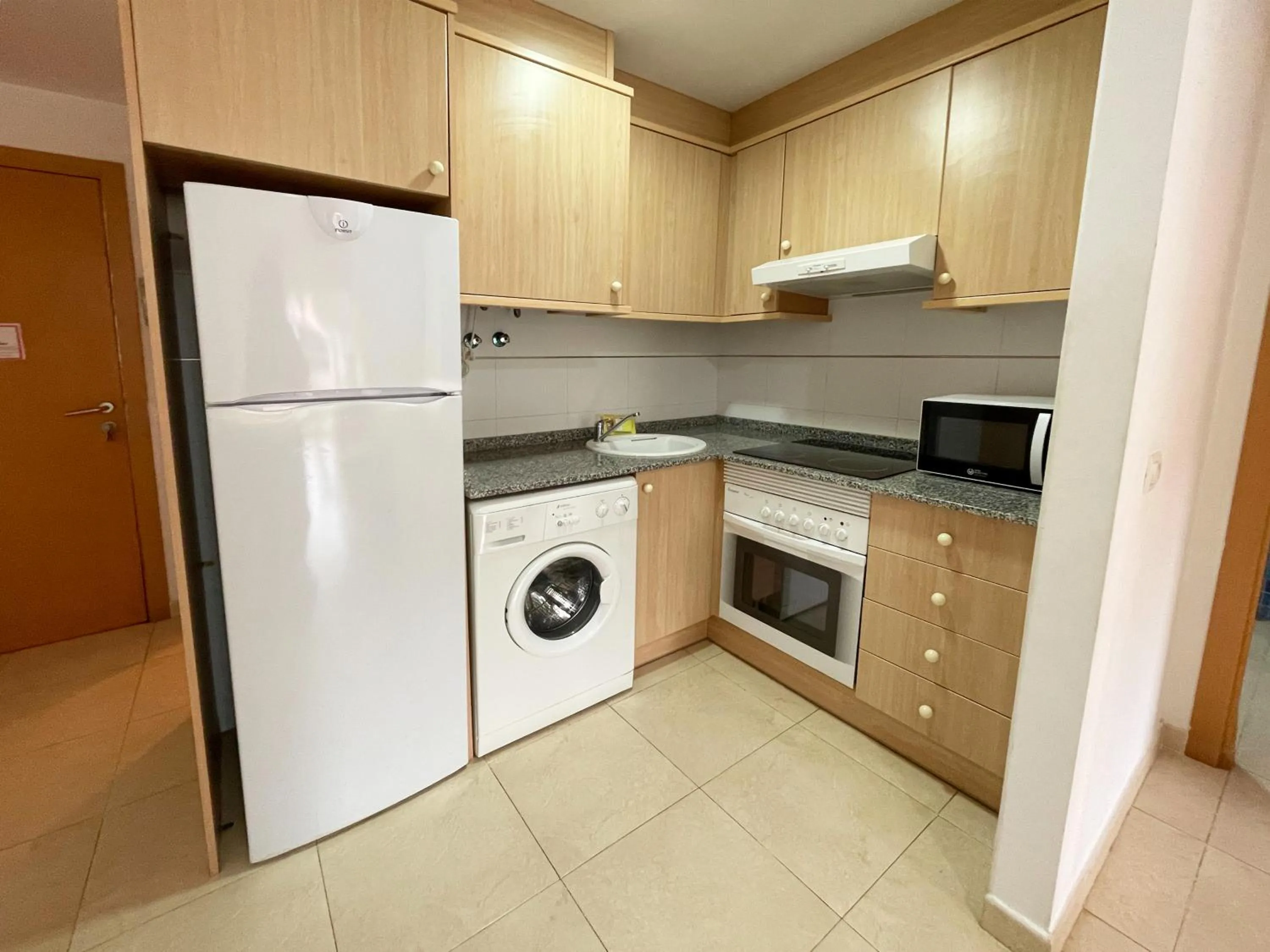 Kitchen or kitchenette in Apartamentos Los Almendros 3000