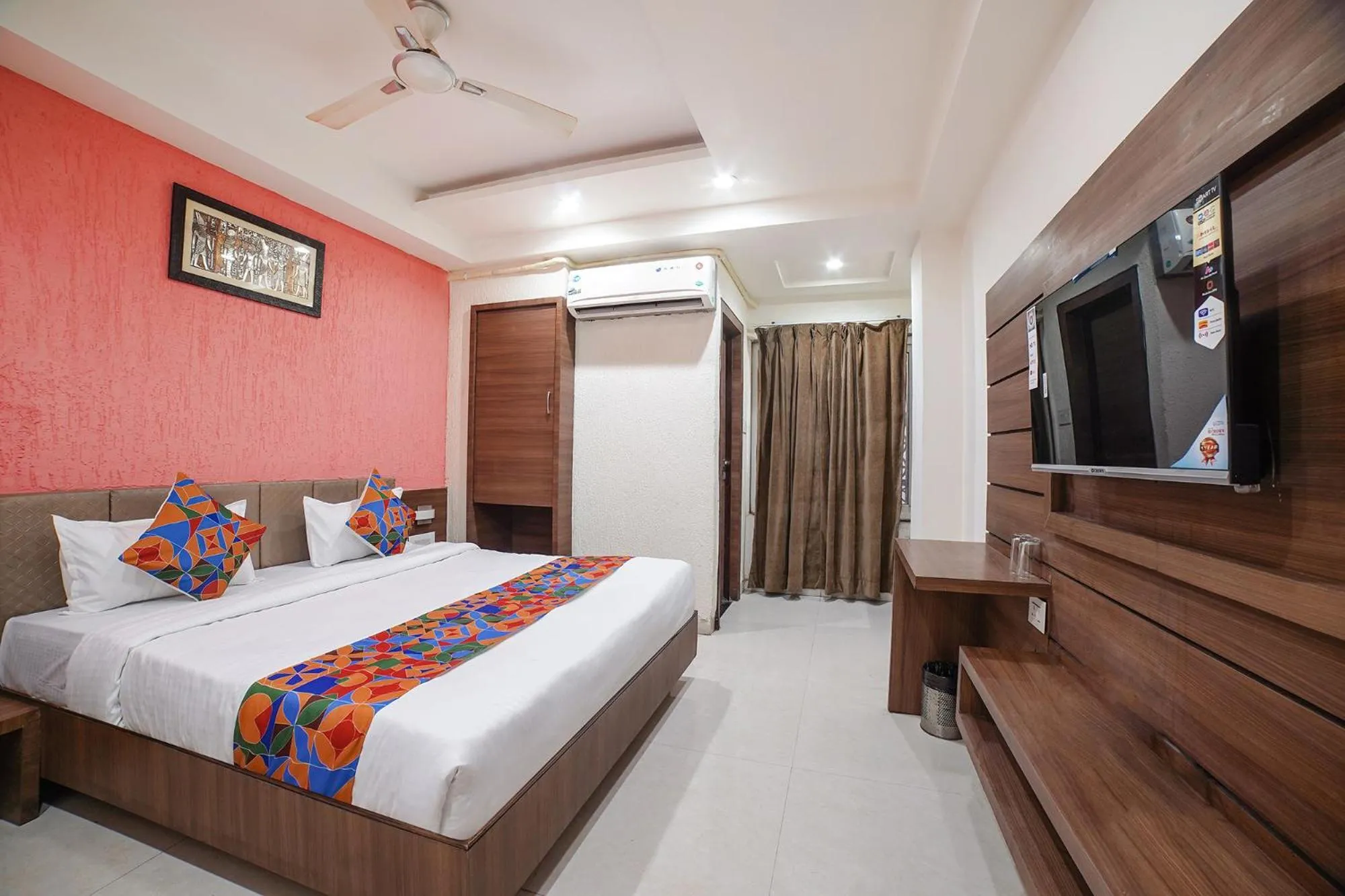 Bed in FabHotel Johri Regency