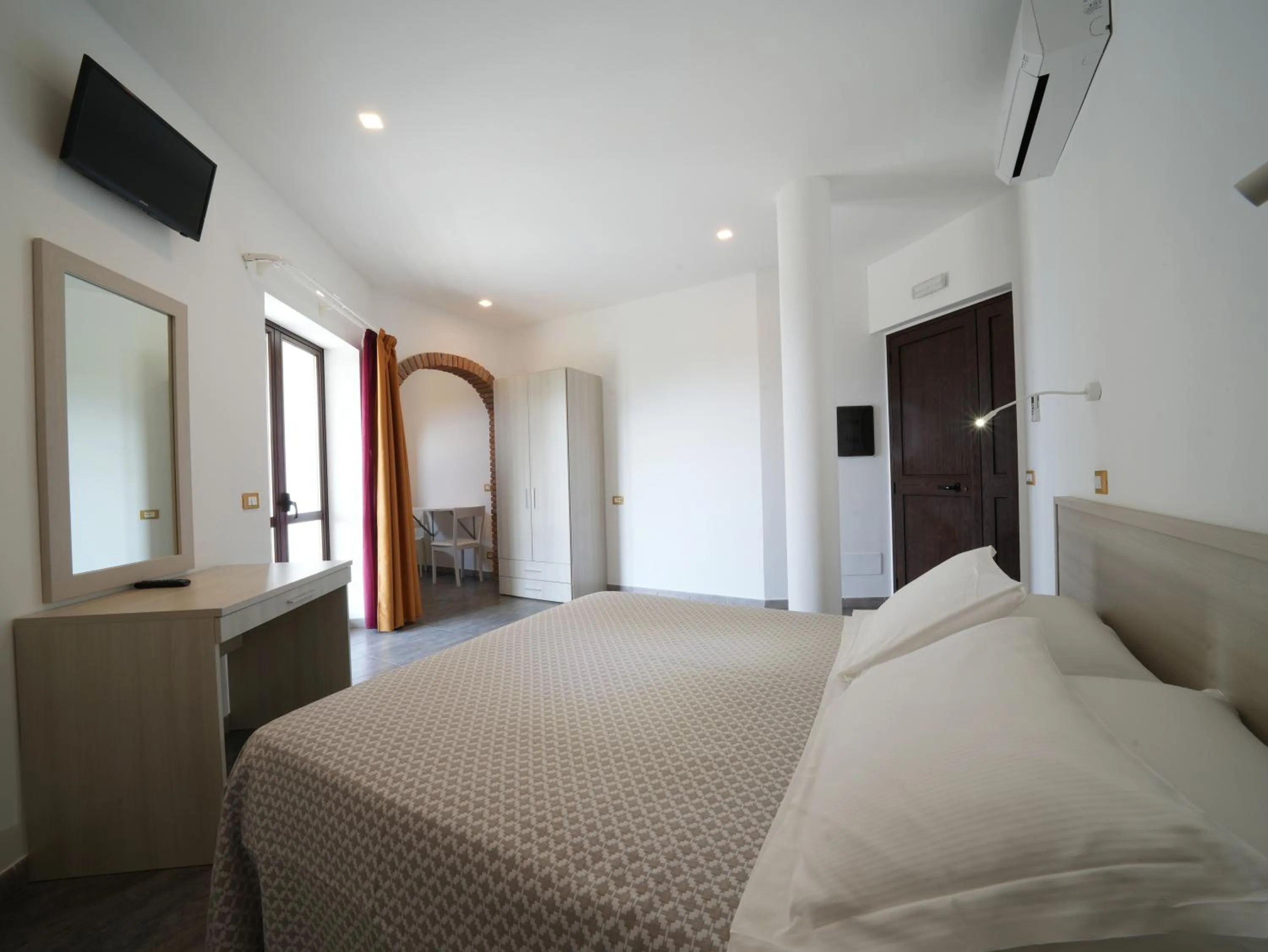 Photo of the whole room, Bed in LUZIA AGRIRESORT - Piscina Idromassaggio con Vista Mare Aperta fino alle ore 23-00