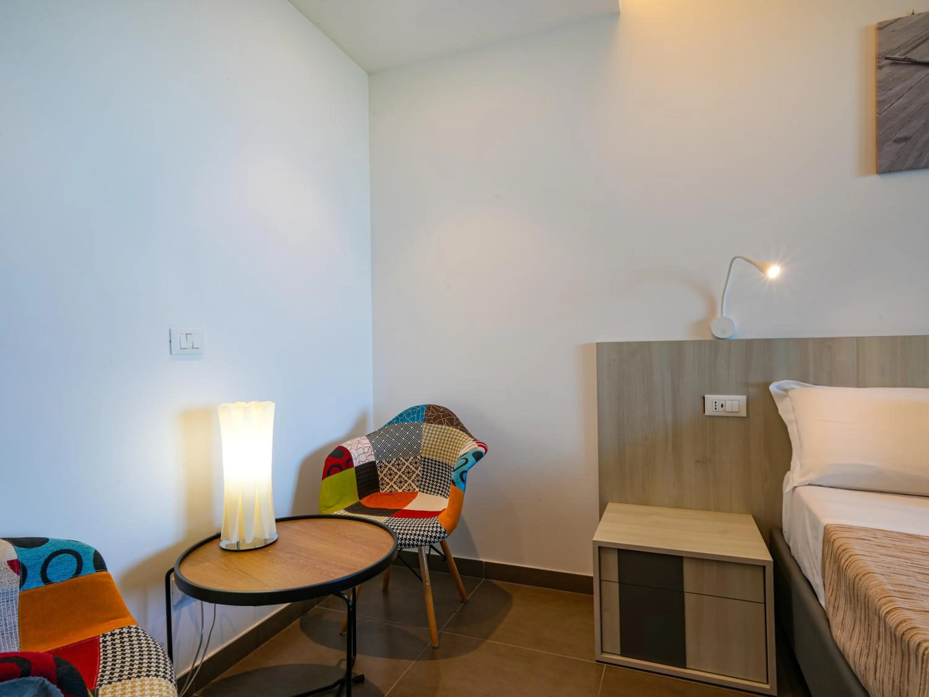 Living room, Bed in LUZIA AGRIRESORT - Piscina Idromassaggio con Vista Mare Aperta fino alle ore 23-00