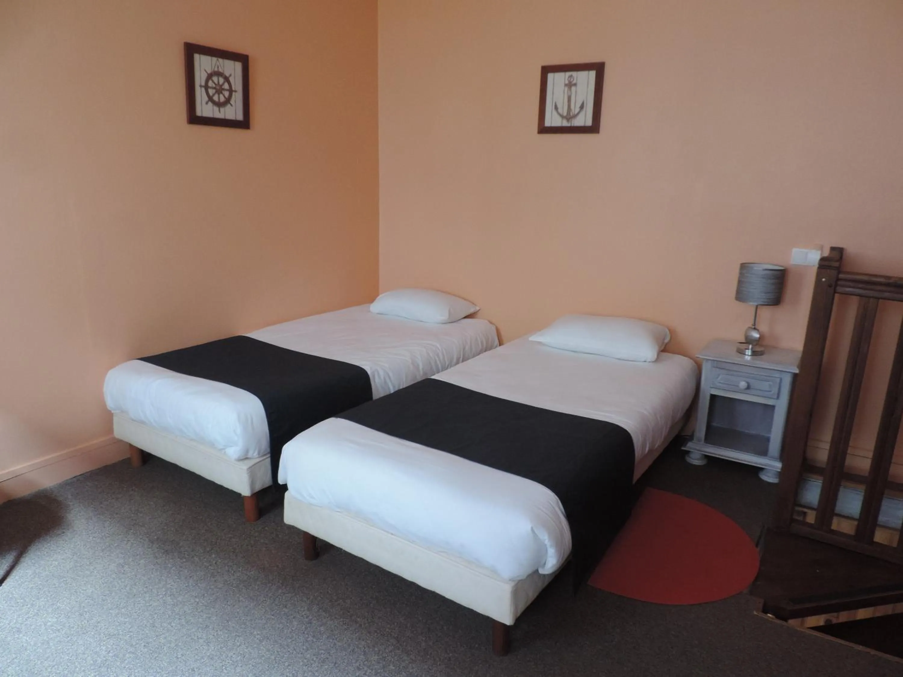 Photo of the whole room, Bed in Hôtel Le Chantilly