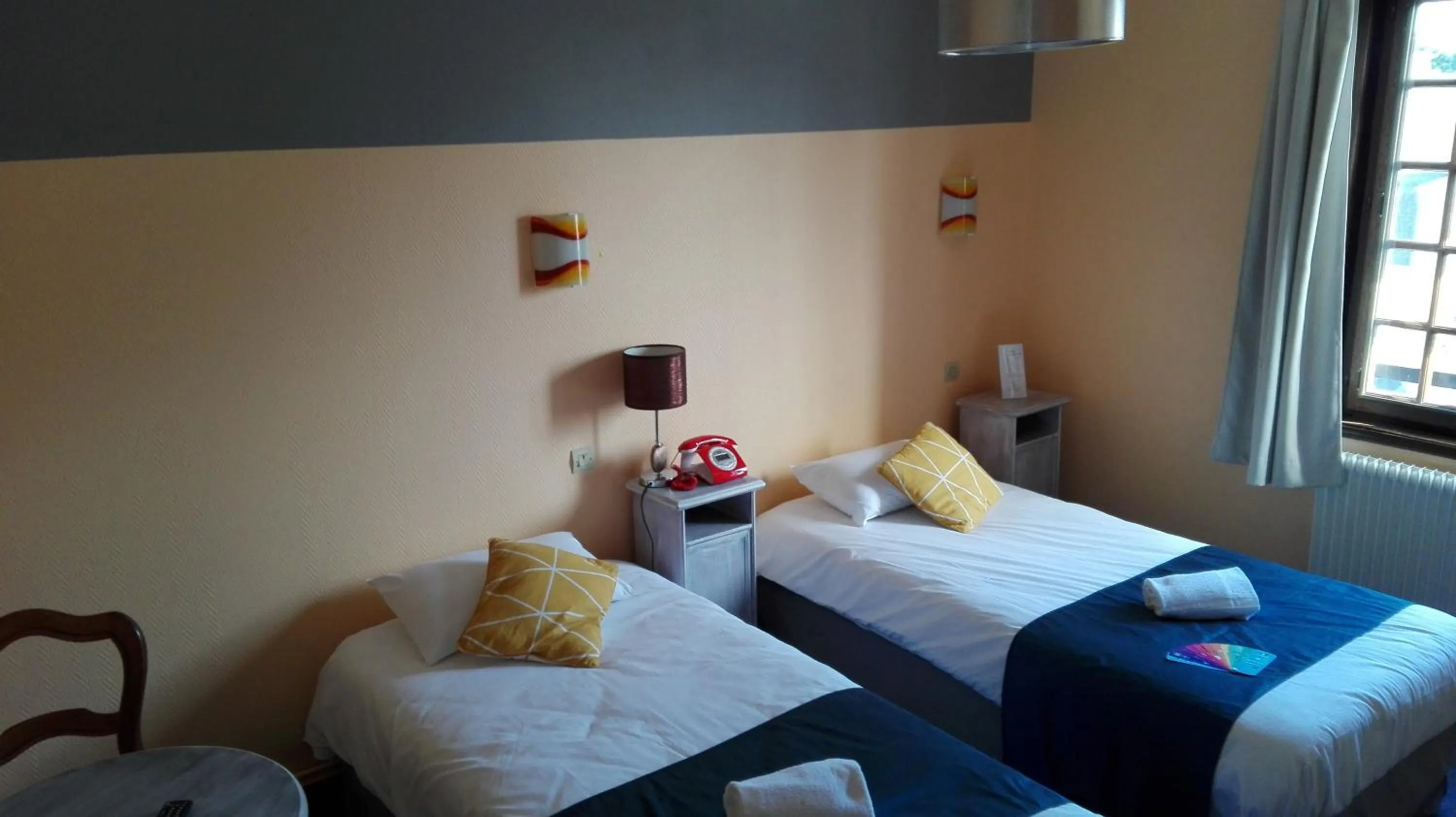 Bed in Hôtel Le Chantilly