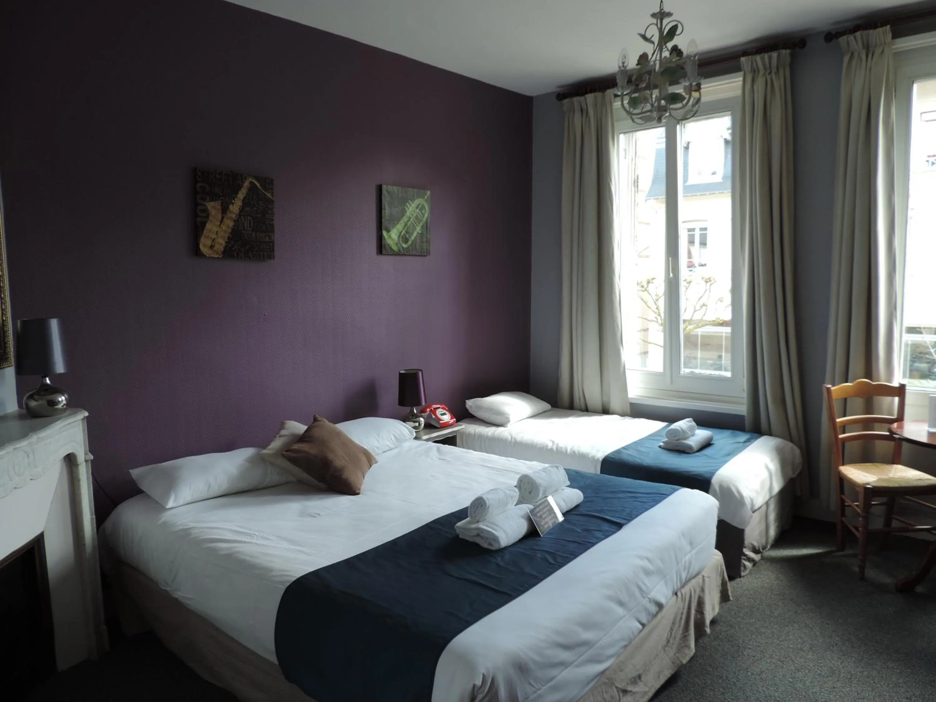 Photo of the whole room, Bed in Hôtel Le Chantilly
