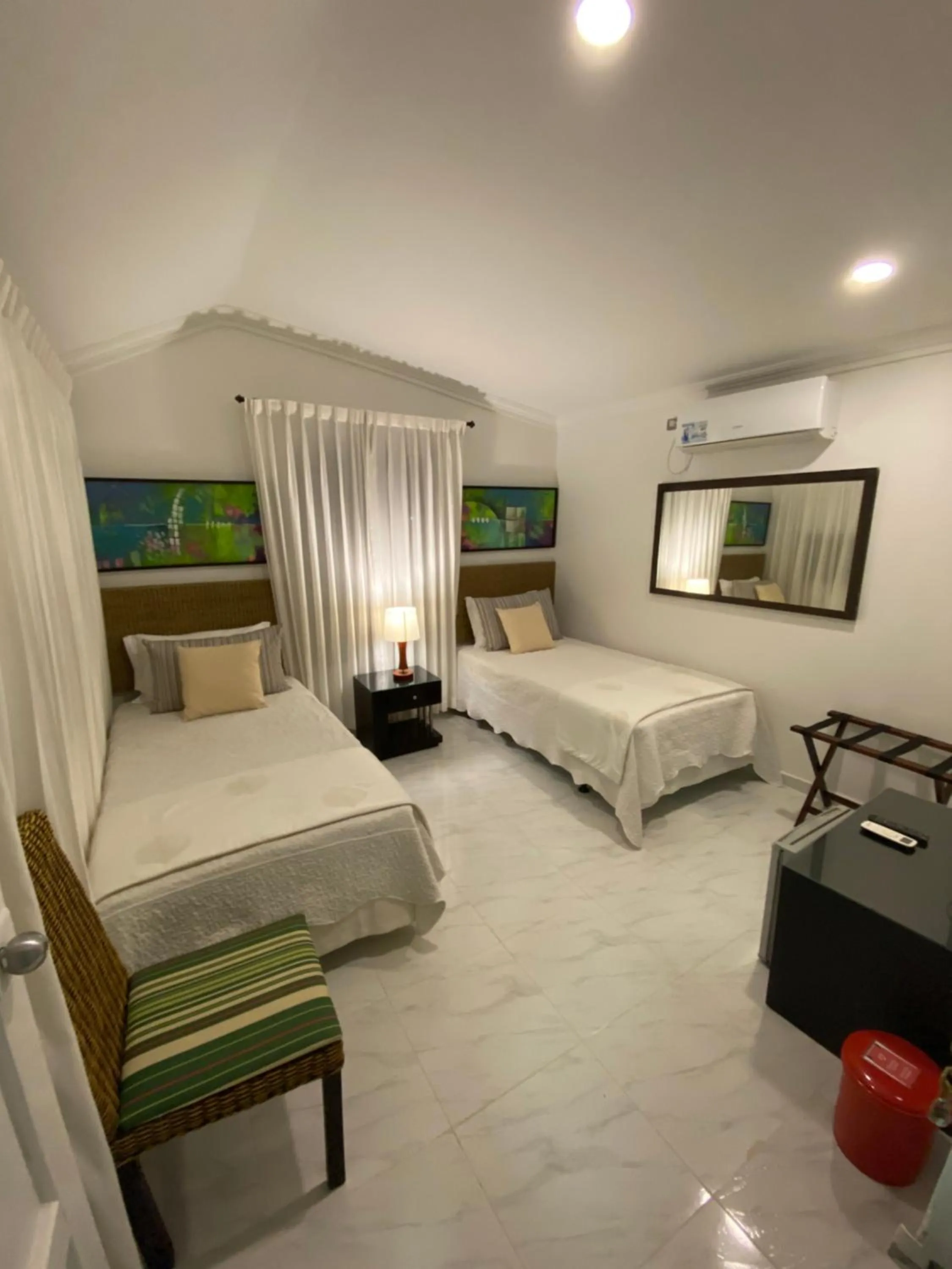 Photo of the whole room, Bed in Red Ground Village