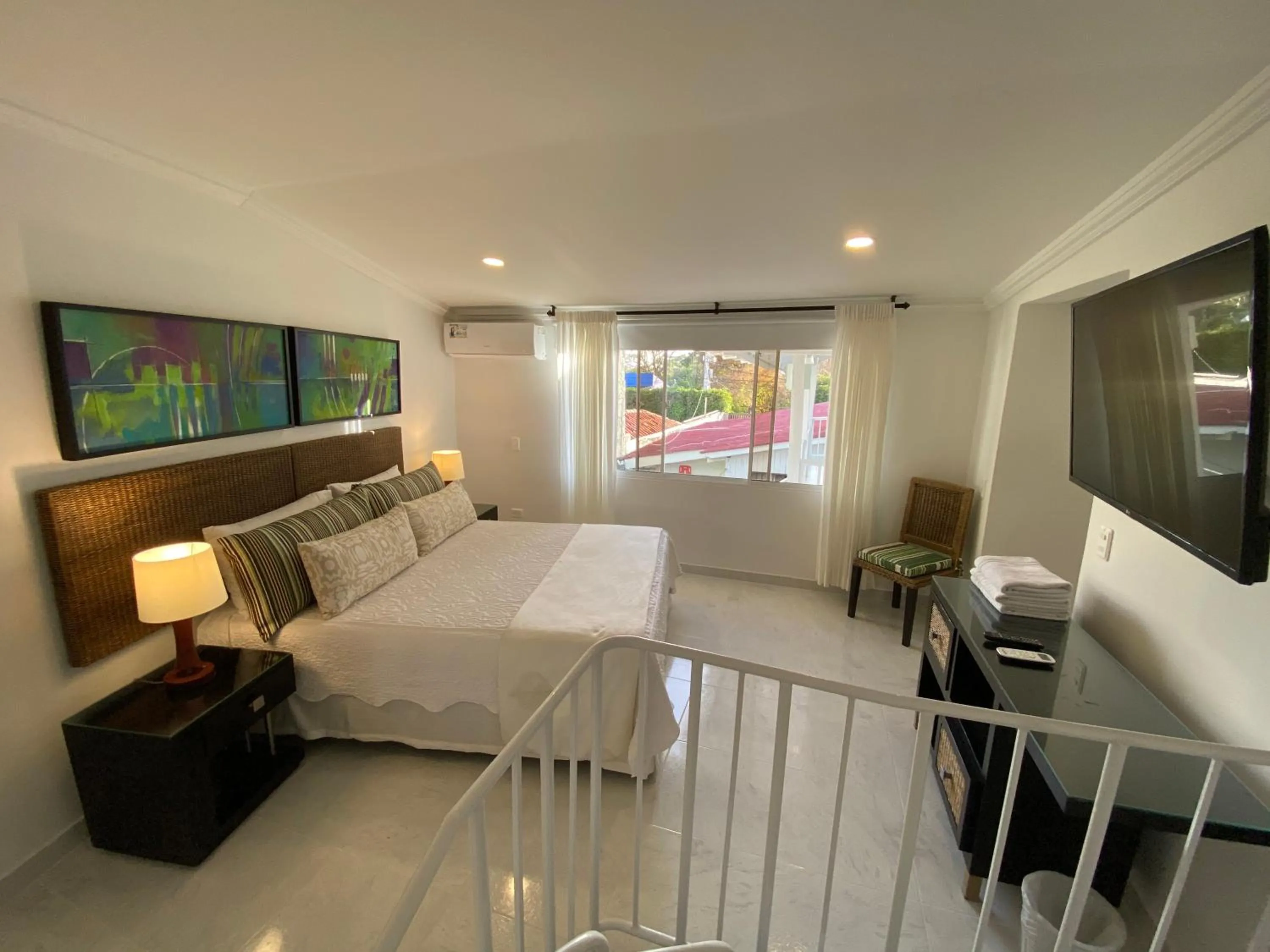 Photo of the whole room, Bed in Red Ground Village