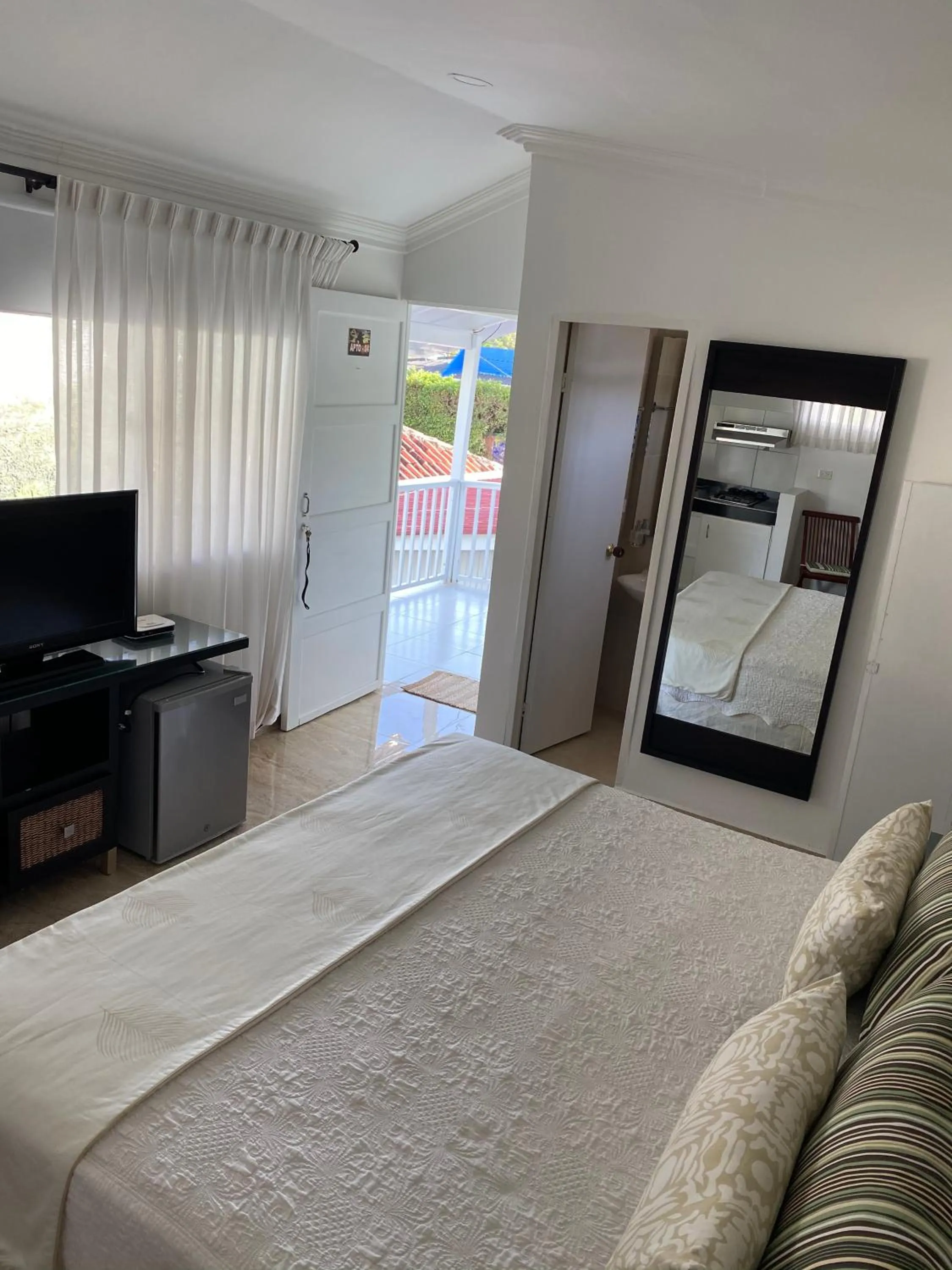 Photo of the whole room, Bed in Red Ground Village